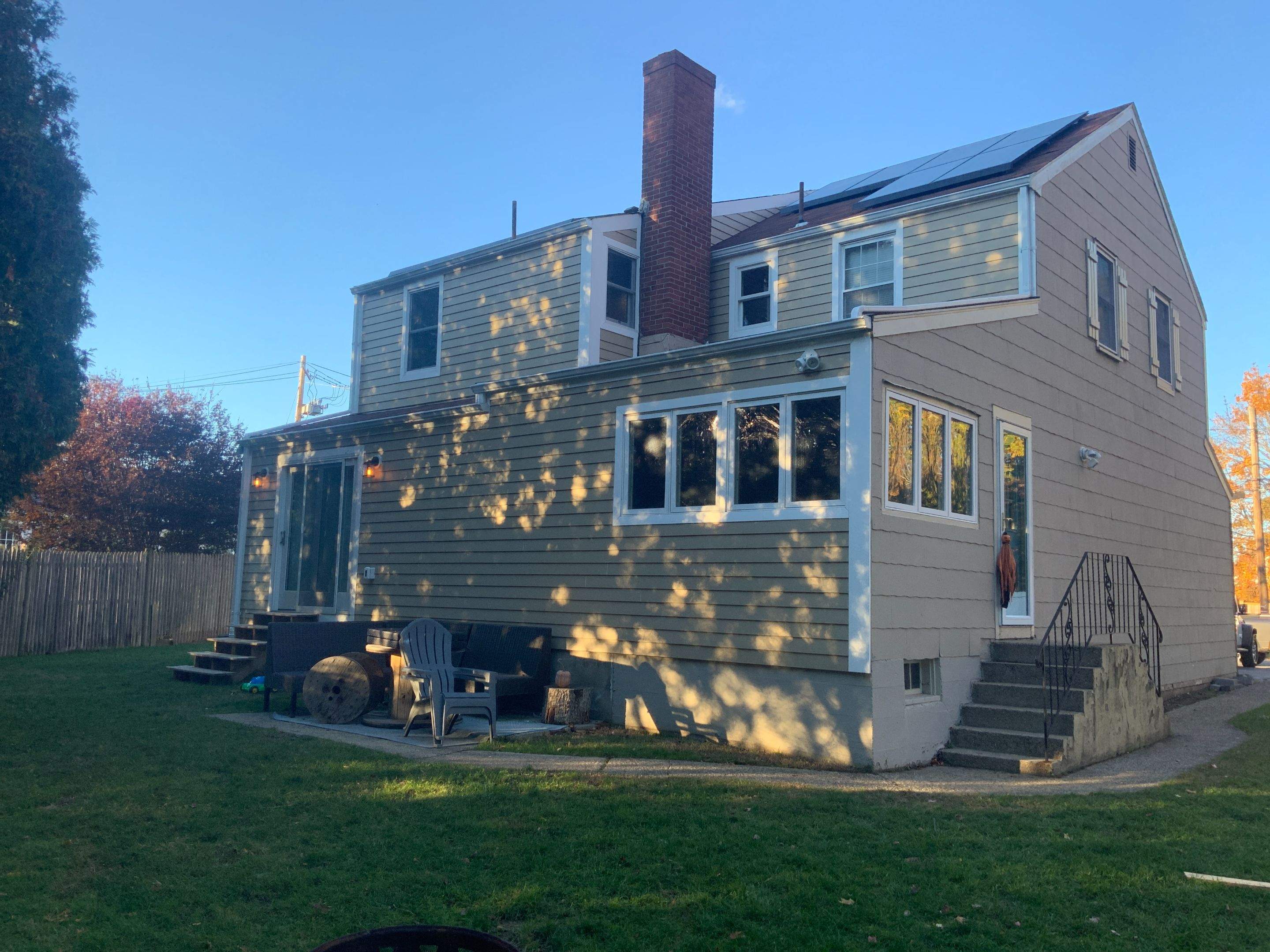 James Hardie siding, new metal roof and couple windows being installed. by UBrothers Construction