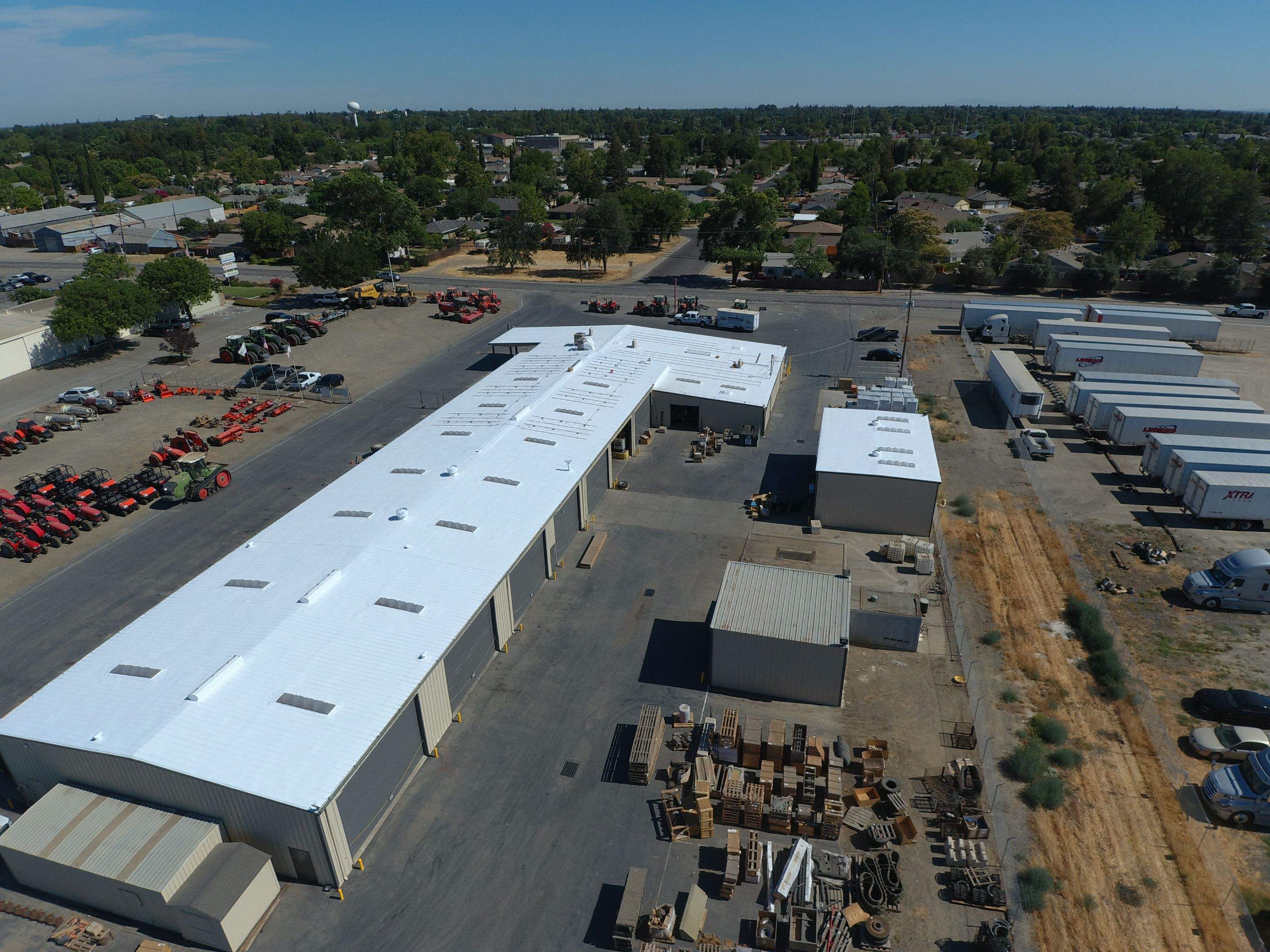 Spray foam and coatings using Conklin Benchmark/PUMA XL coatings and spray foam by Straight Edge Roofing Inc
