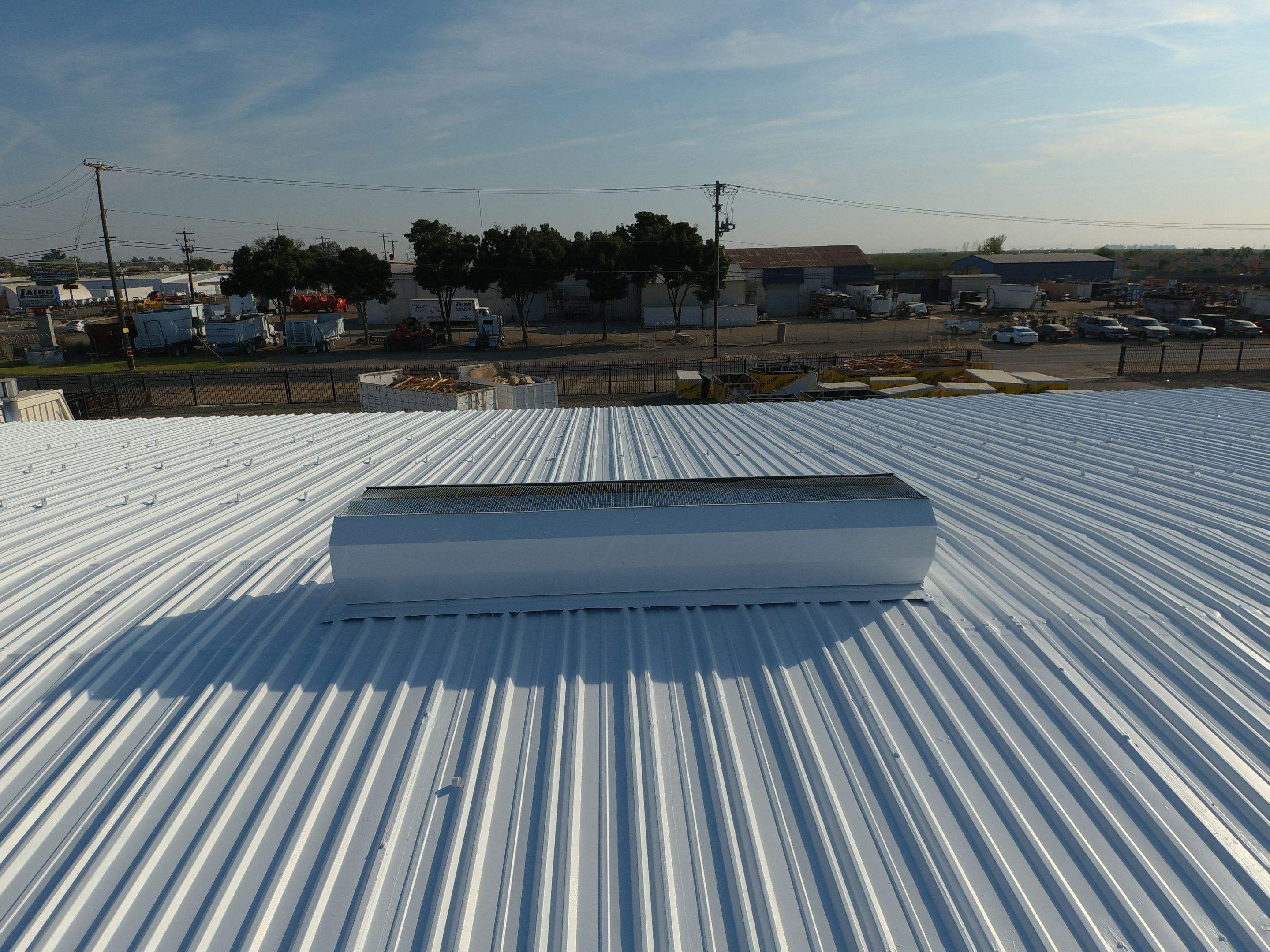 Metal Restoration Roofing system with Benchmark/PUMA XL 20 yr warranty by Straight Edge Roofing Inc