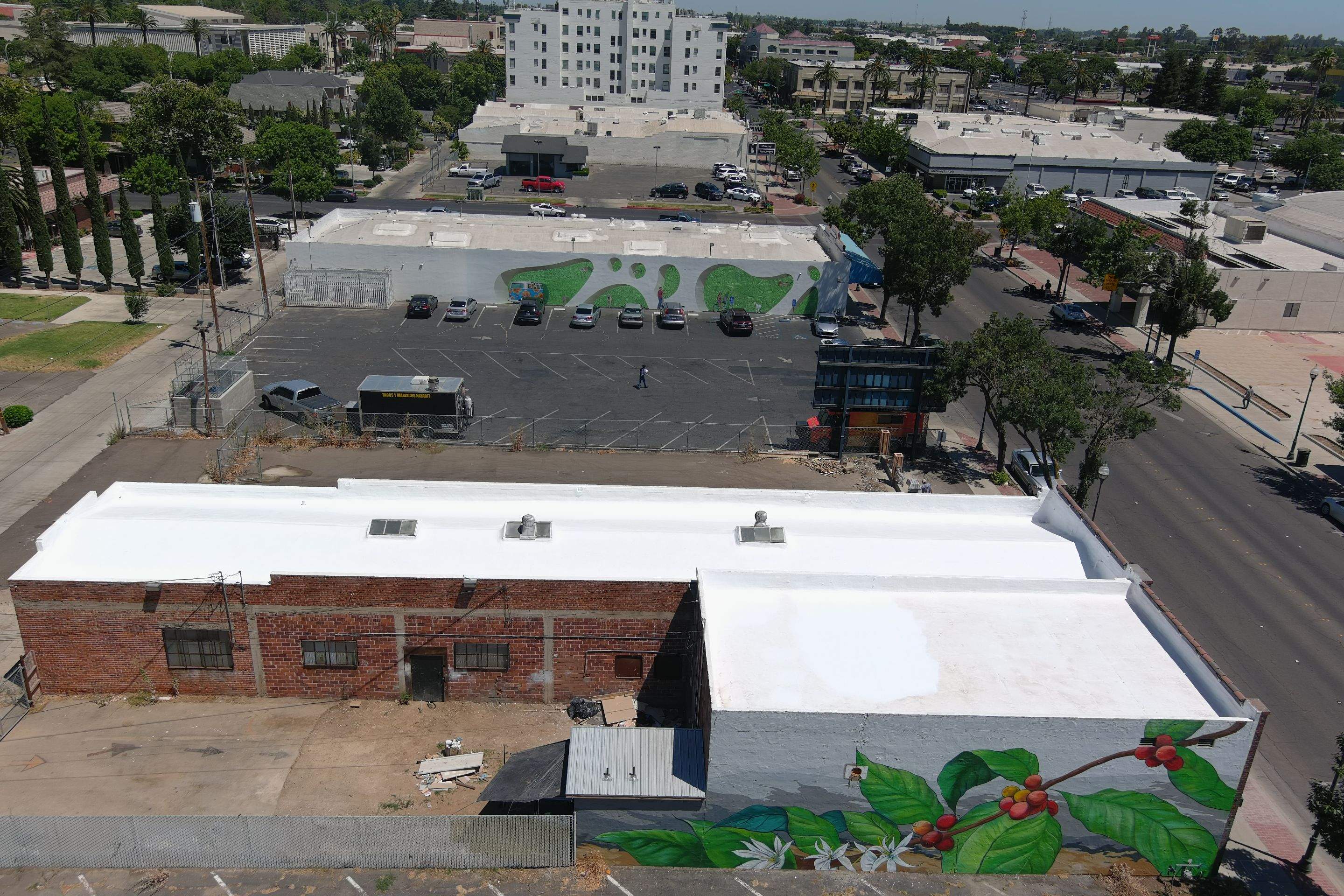 Commercial Roofing Installation using Conklin BenchPly system with PUMA top coat (imbedded fabric system) by Straight Edge Roofing Inc