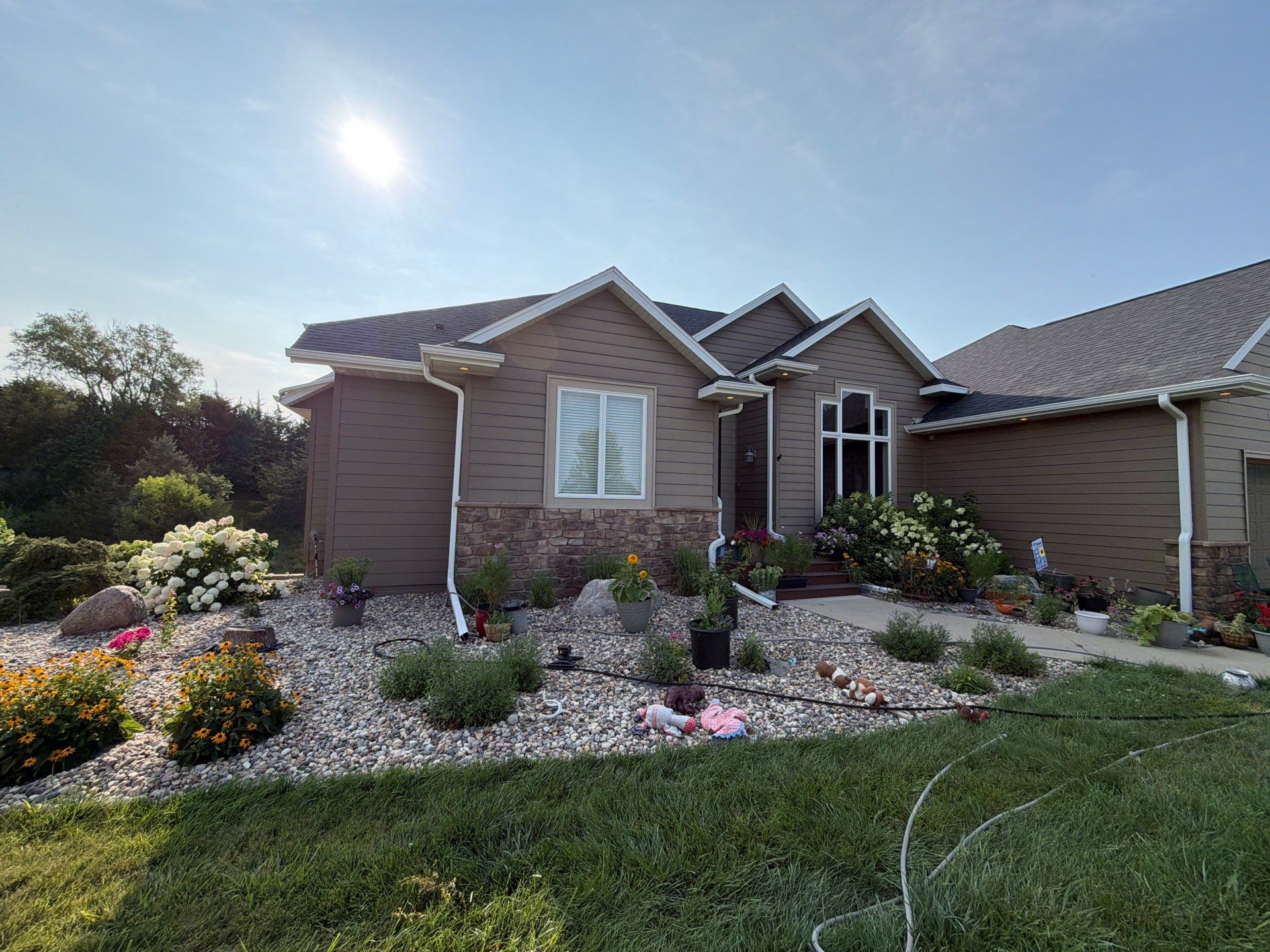 Sioux Falls Residential Exterior Painting and Siding Refresh by Select Painting, Coatings & Garage Cabinets
