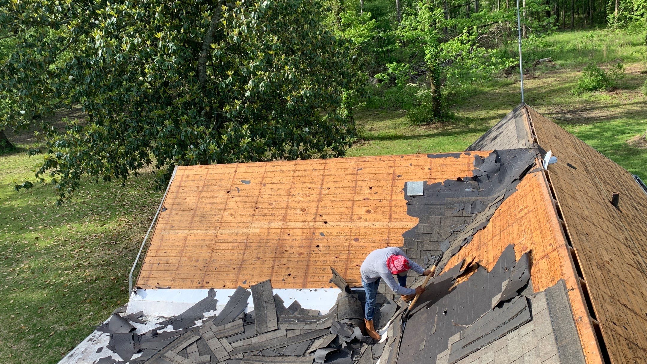 Residential Roofing Installation using 50 mil PVC by Hostetler Roofing