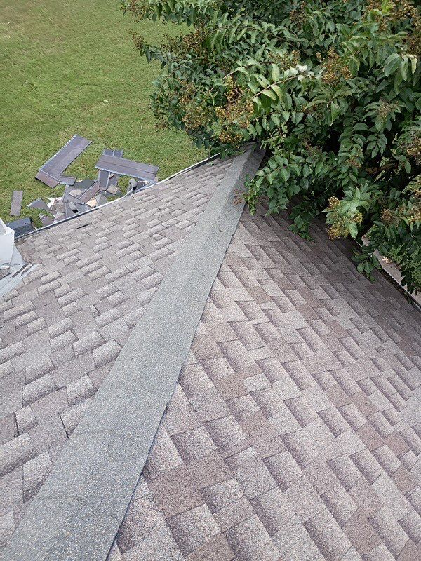 chimney flashing and roof repair in Edmond by McCann's Roofing and Construction