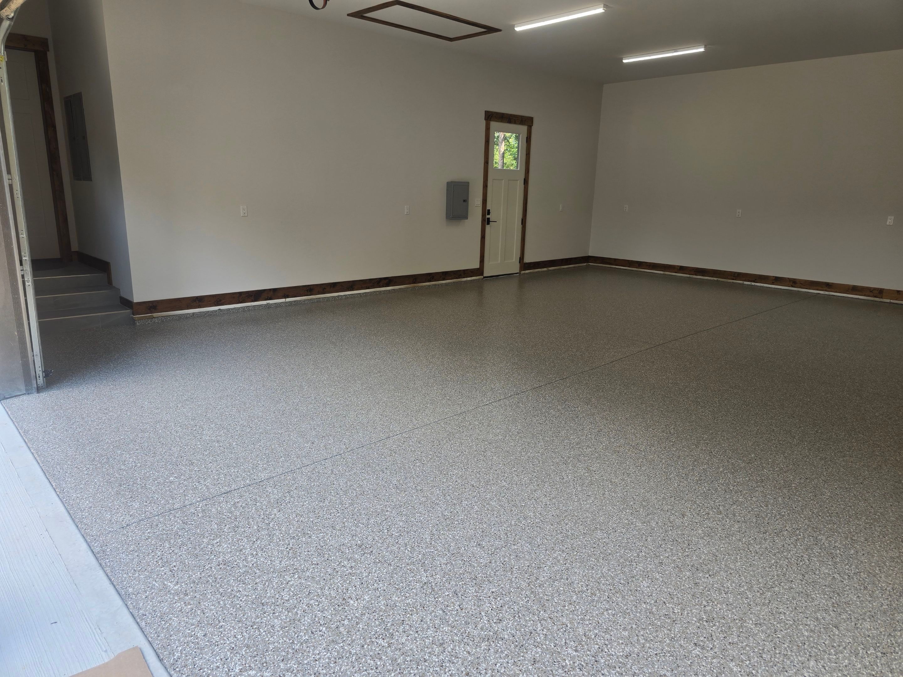 Garage using Creekbed by Elite Floor Solutions