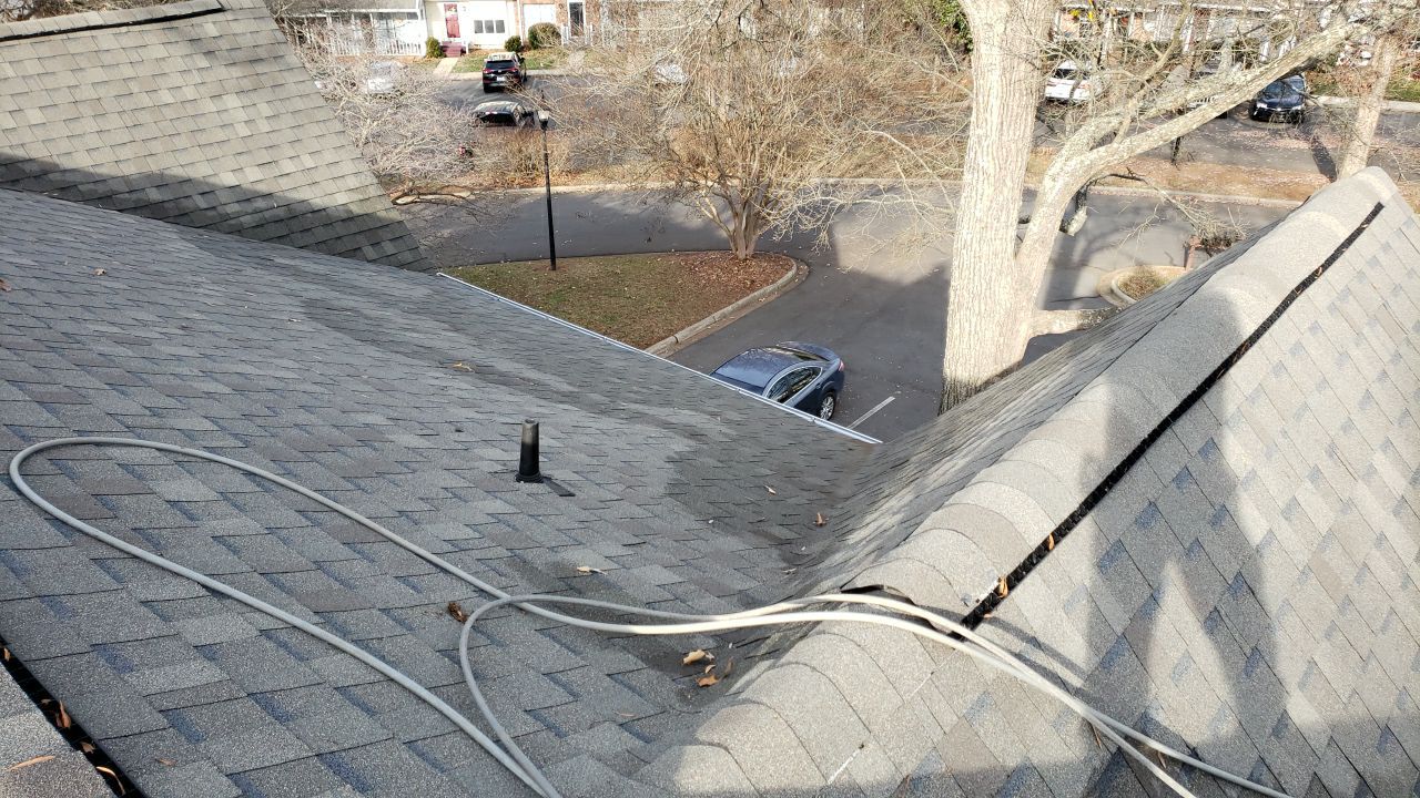 Gutter Cleaning using water by Power Wash Masters LLC