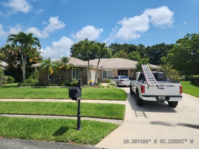 Concrete Tile Roof Restoration and Flat Roof Installation in Boca Raton
