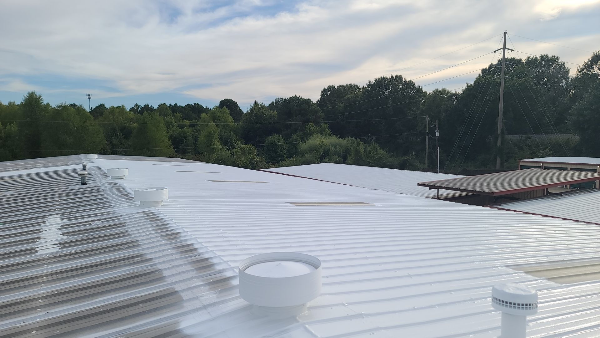 Commercial Metal Restoration System using Aldocoat Coatings by Hostetler Roofing
