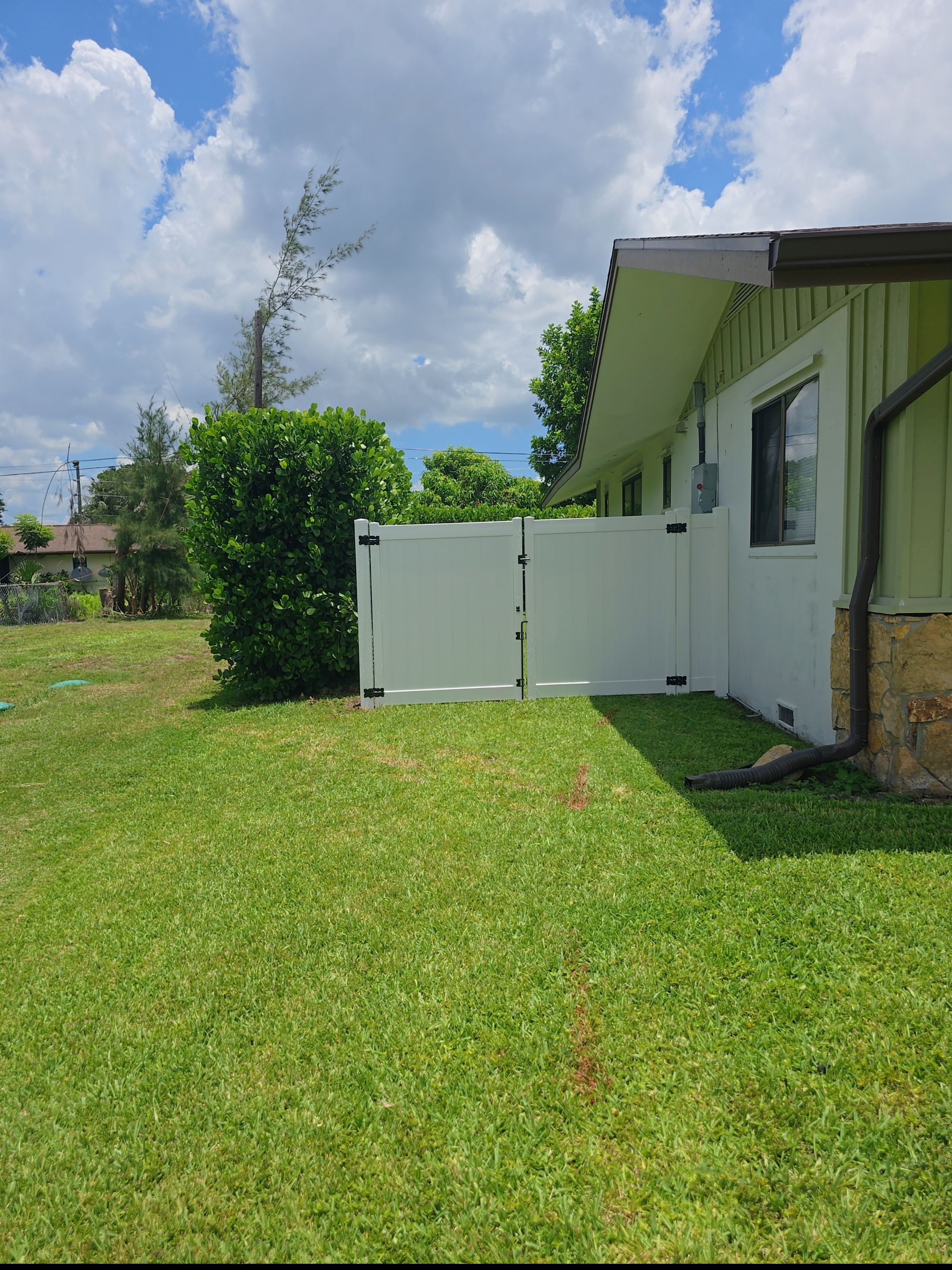 Residential Chain Link Fence Repair and Vinyl Privacy Gate Installation in Naples by True Fence LLC
