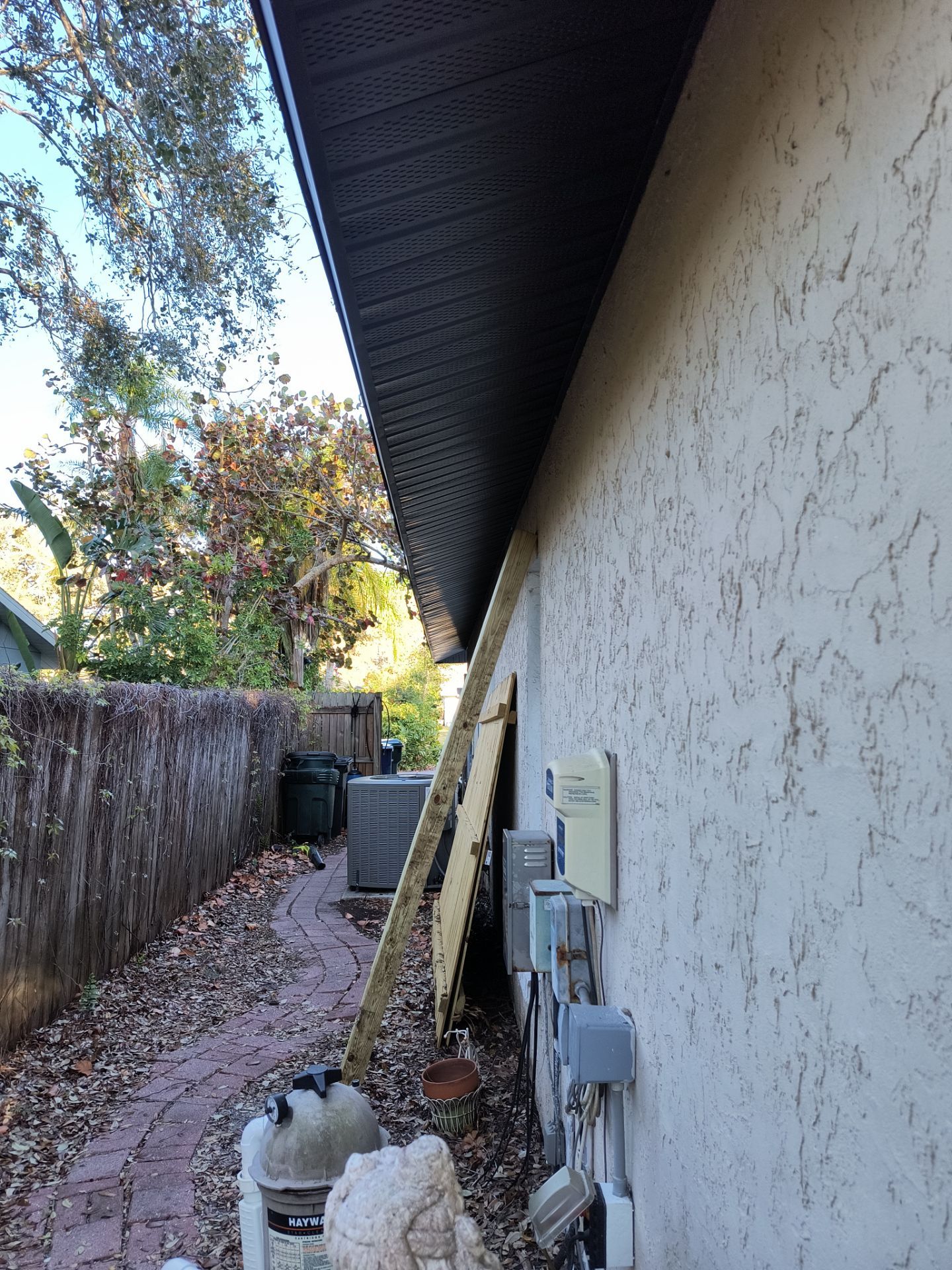 Gutter Repair Service in Sarasota FL - Black Soffit by Gutter Professors