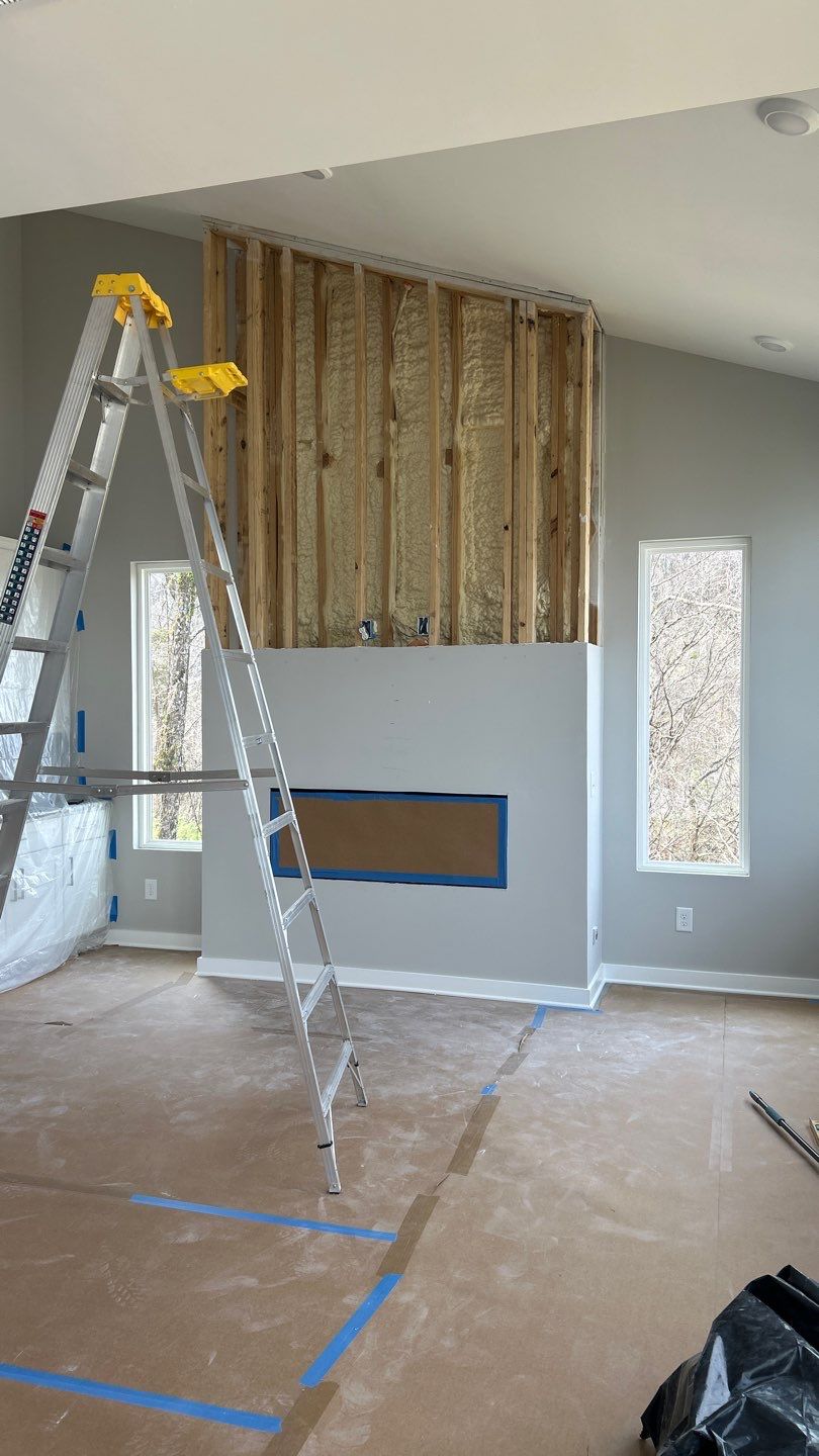 Floor to Ceiling Fireplace Surround by Footprints Floors of Nashville