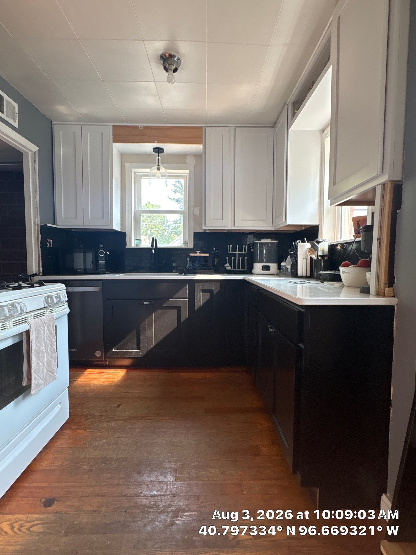Lincoln Kitchen Remodel With Black and White Two-Tone Cabinetry by CompanyCam Sales Demo