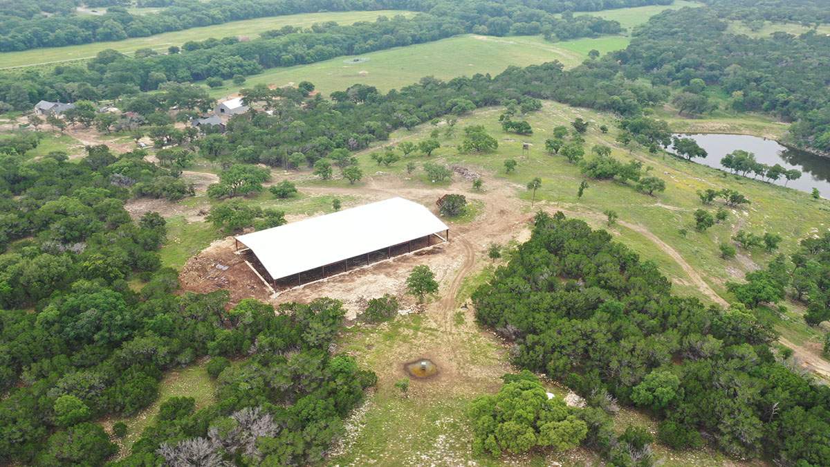 150K Equestrian center with 25K backup tank for potable water. by Hill Country Rain Water