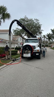 Cleaning Two Clogged Catch Basins for a Community