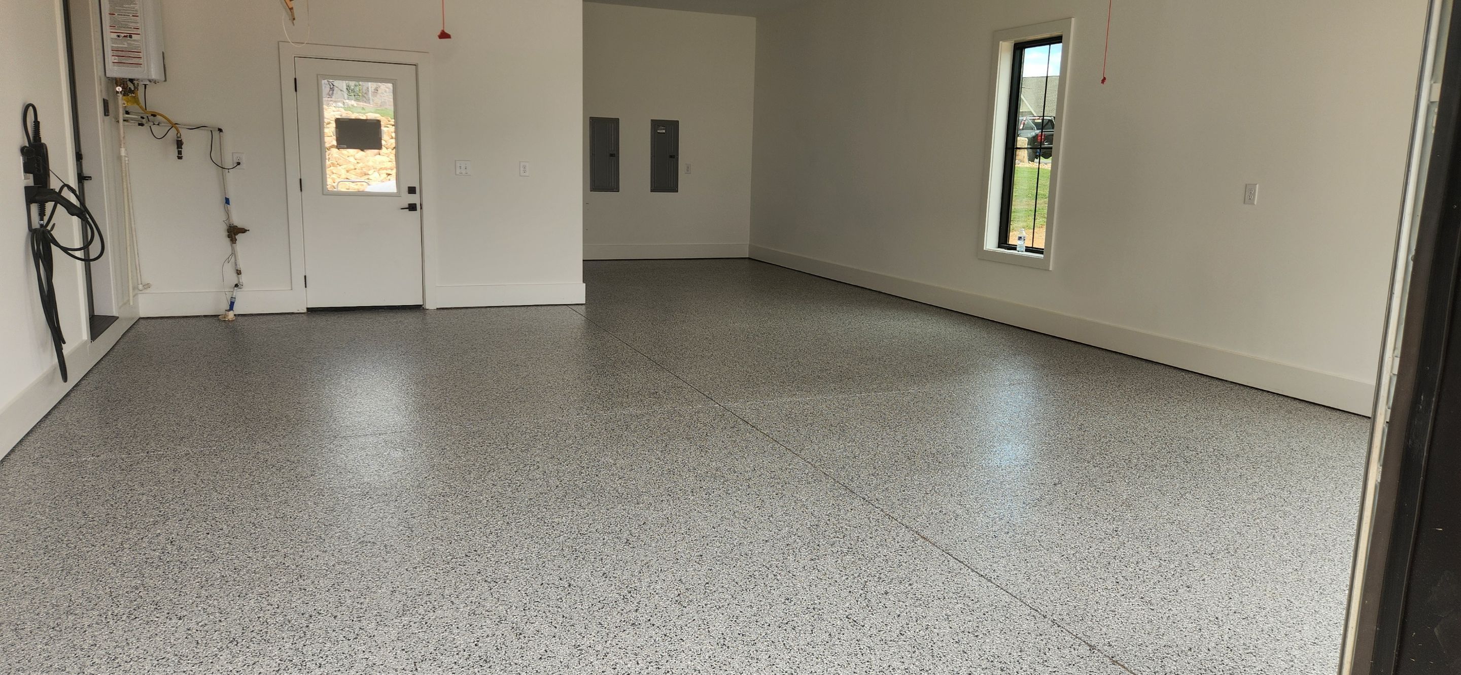 Garage Transformation Using Houndstooth by Elite Floor Solutions