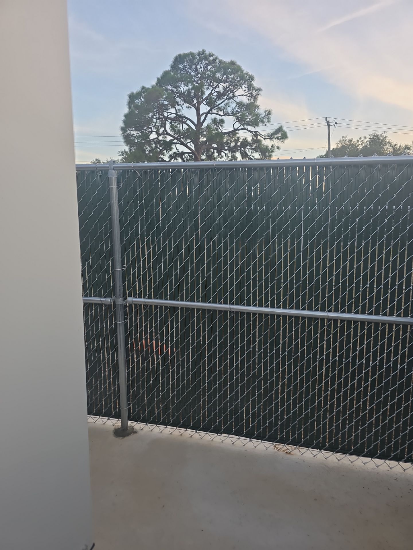 Commercial Chain Link Fence with Slats in Port Charlotte by True Fence LLC