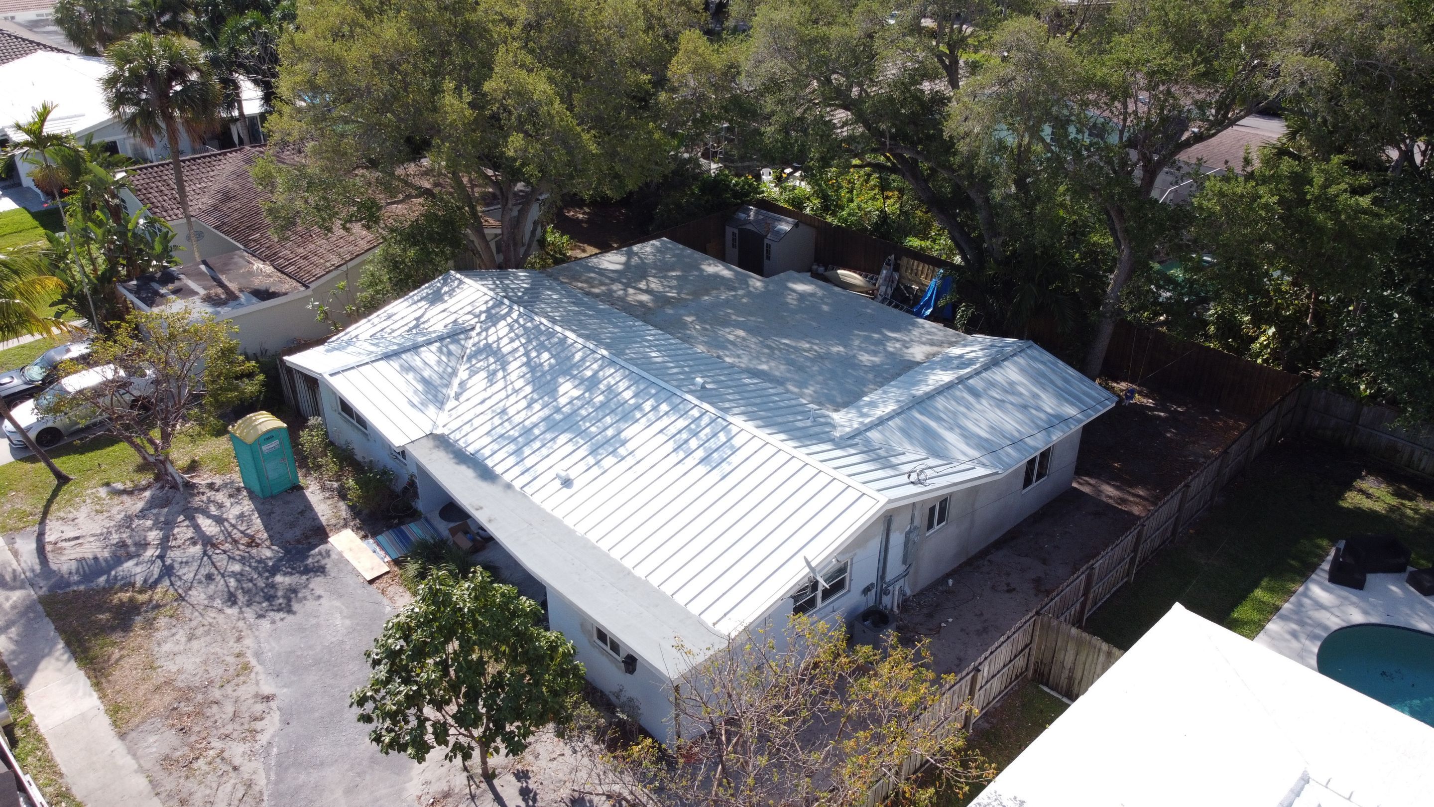 Residential Roofing Installation using 1.5'' Mechanical Seam by BLUES BROTHERS ROOFING