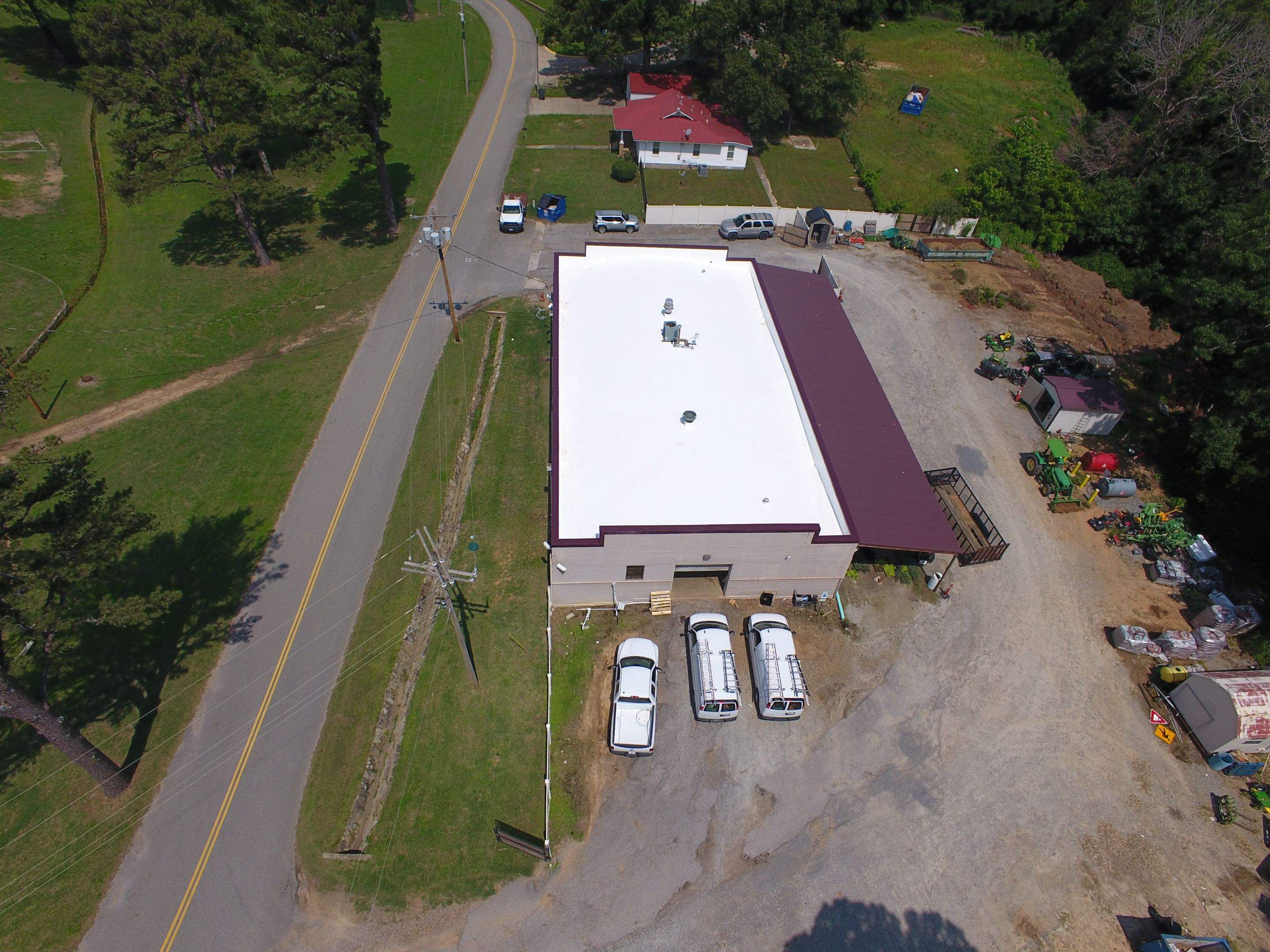 Choctaw Nation Healthcare Center - White Building by Hostetler Roofing
