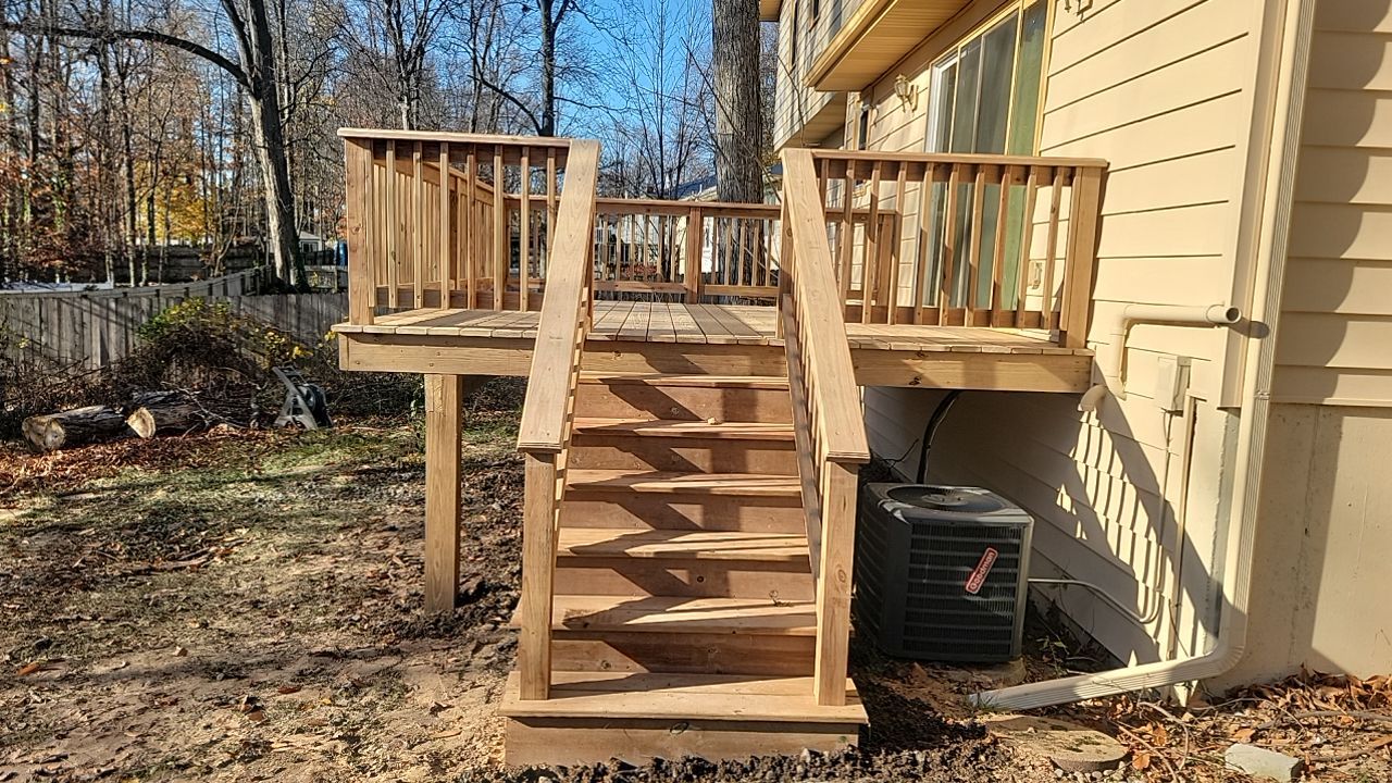 Deck Installation using Treated Lumber by Avalon Roofing and Exteriors
