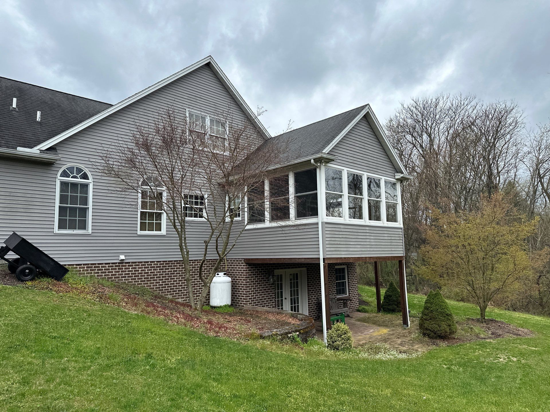 Full Vinyl Siding Replacement and Shingle Roof Install in Millersburg by Esh Builders