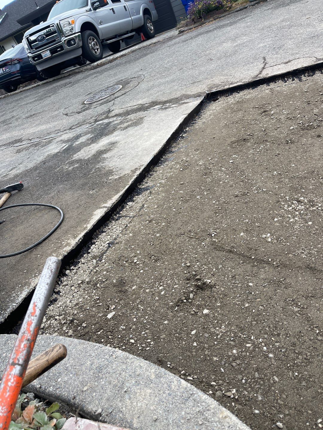 Concrete Driveway Makeover w/ Asphalt Patch | Everett  by Jireh Asphalt & Concrete Inc 