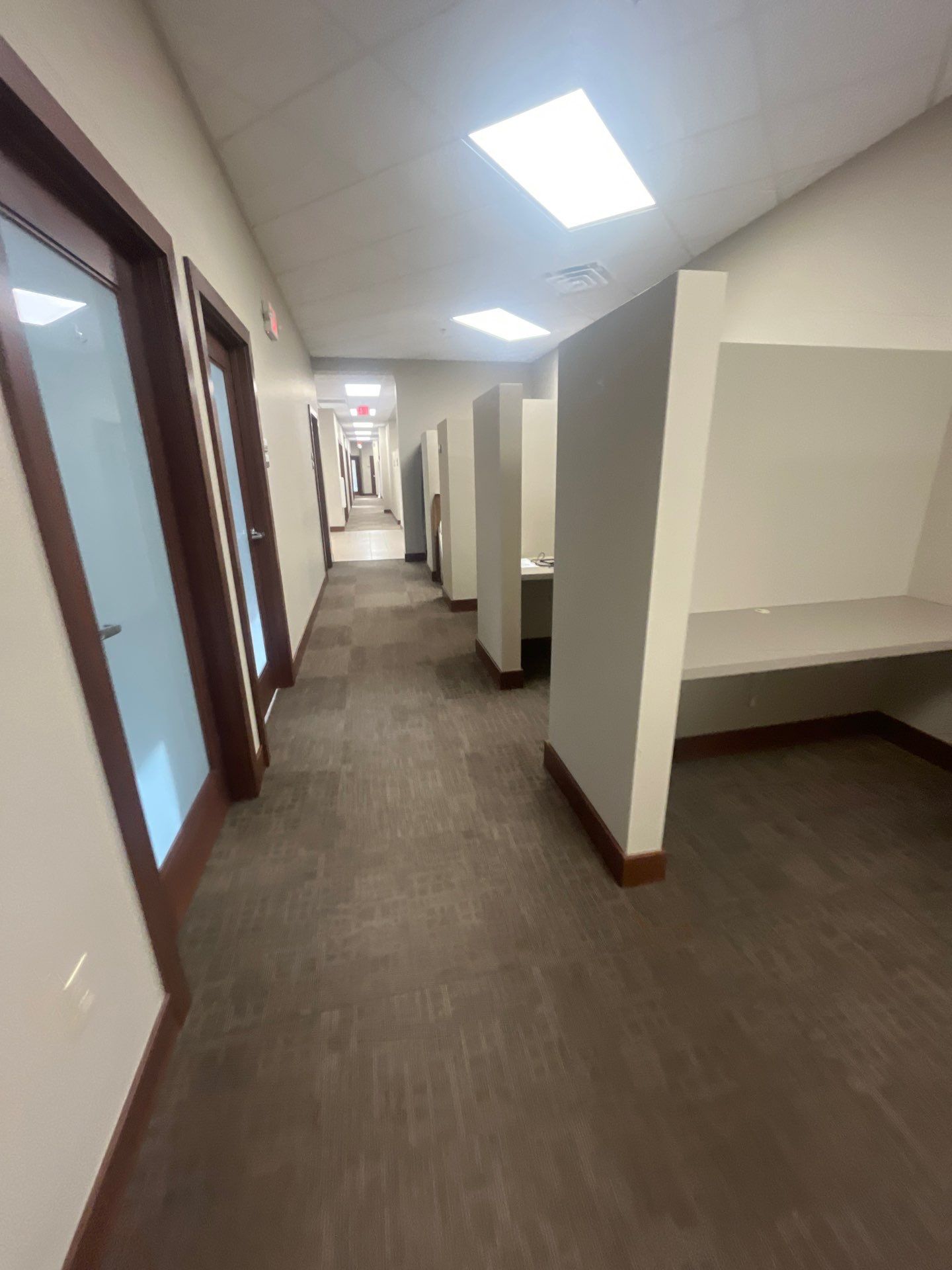 Commercial Office Interior Remodel and Modern Suite Refresh in Sioux Falls by Select Painting, Coatings & Garage Cabinets