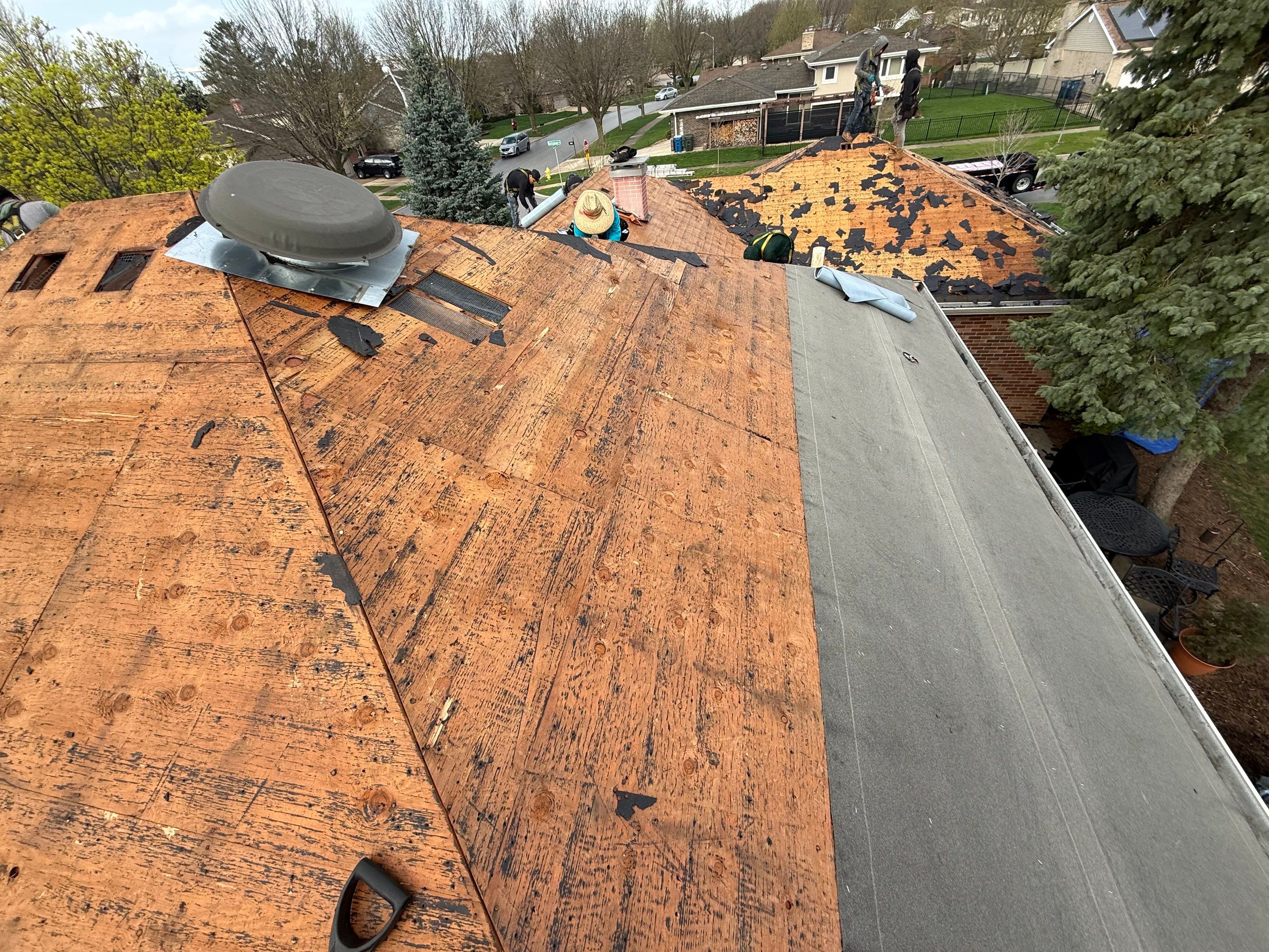 Roof replacement by Optimal Home Improvement 