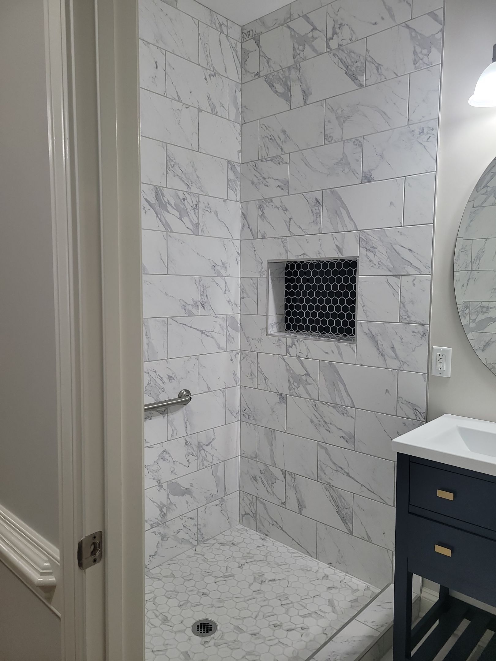 A Pathway to Possibility – Turning a Half Bath into a Full Retreat in Holly Springs by Elite Remodeling and Design LLC