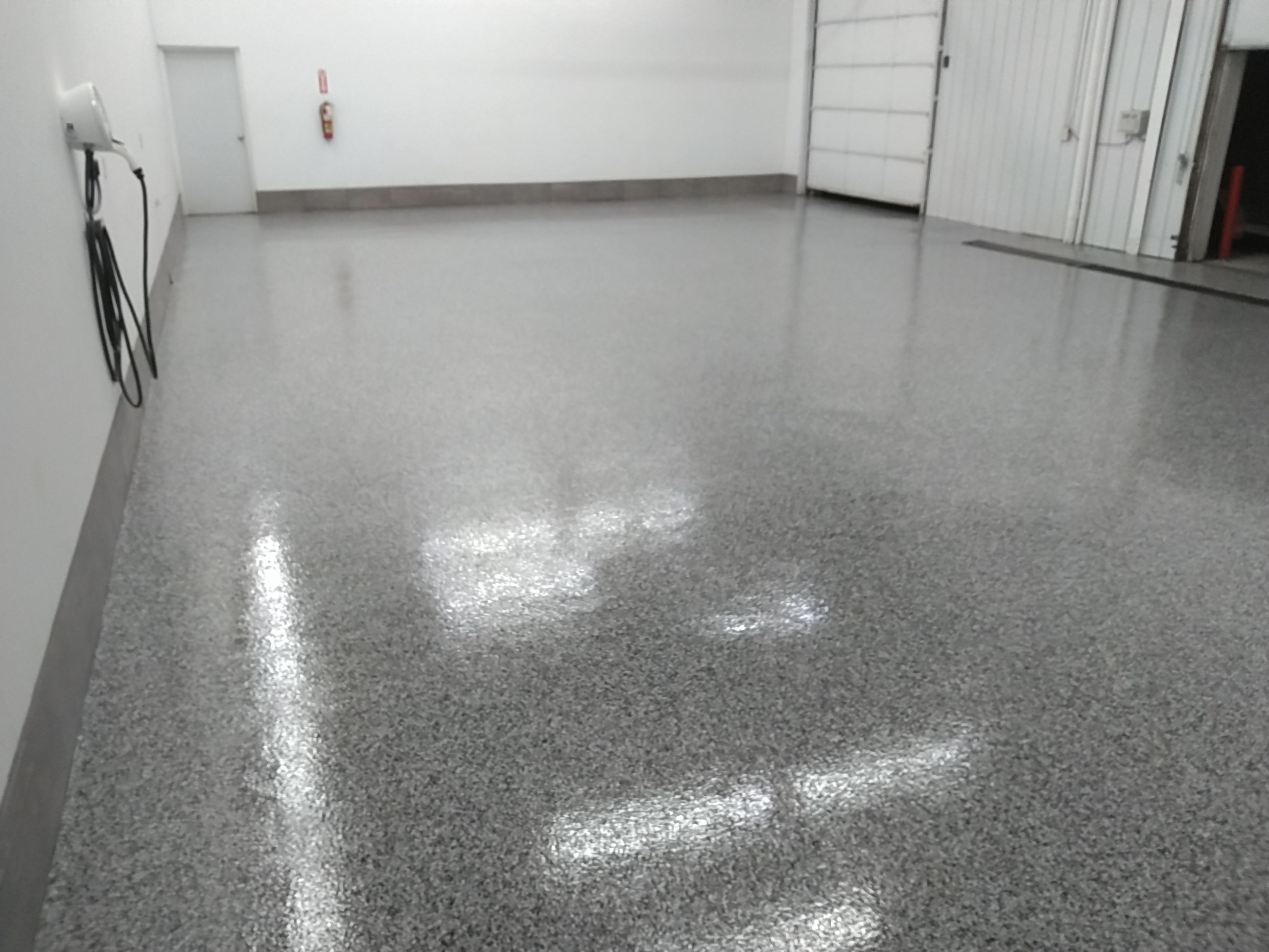 Commerical  using Domino by Fantastic Floors by Miller Custom Exteriors 