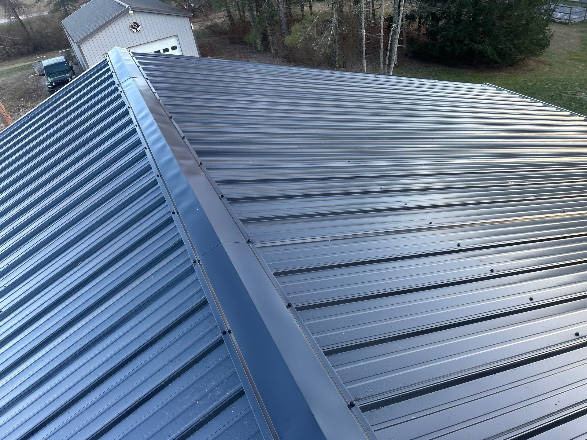 Residential Roofing Installation using Metal by Rainstoppers Roofing