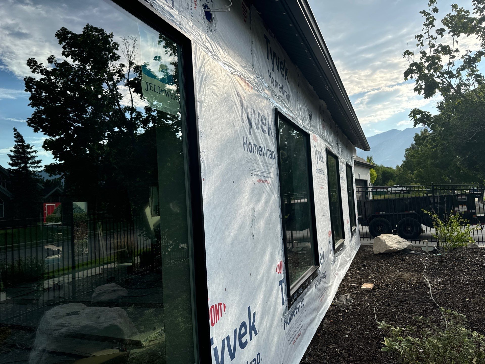 Highland | Modern Farmhouse Board & Batten | Arctic White & Black by Ideal Siding Utah