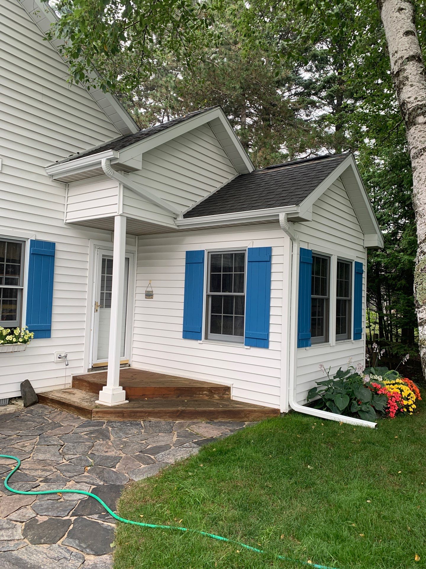 Seamless Gutter Installation for Frankfort Home and Sunroom by Rainbow Seamless Systems