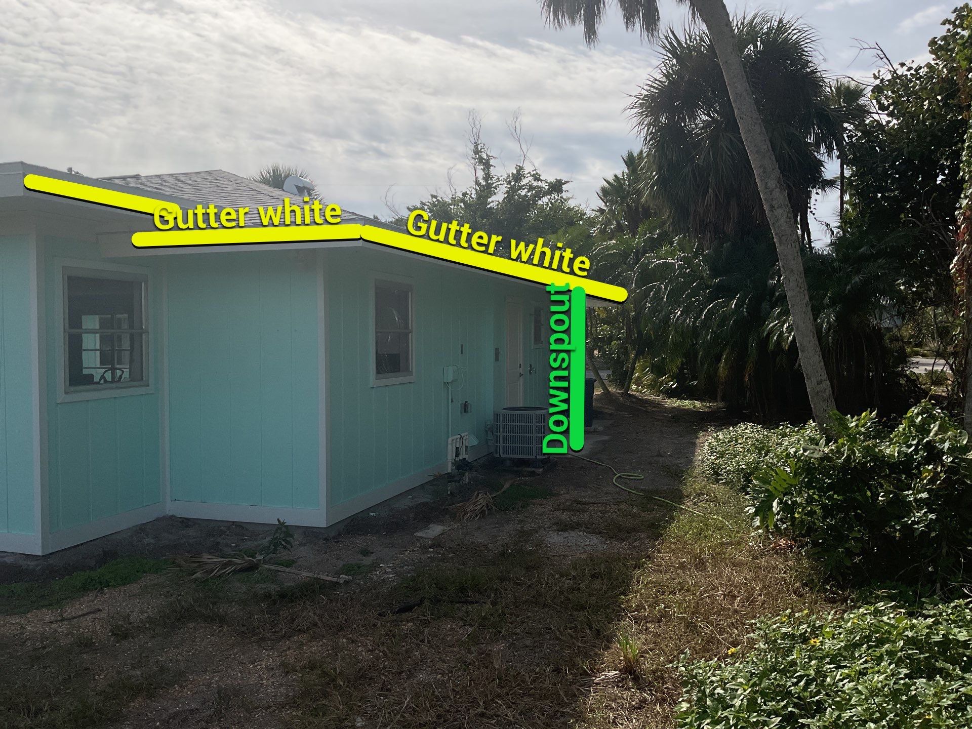 White Seamless Gutters Installation in Sanibel FL by Gutter Professors