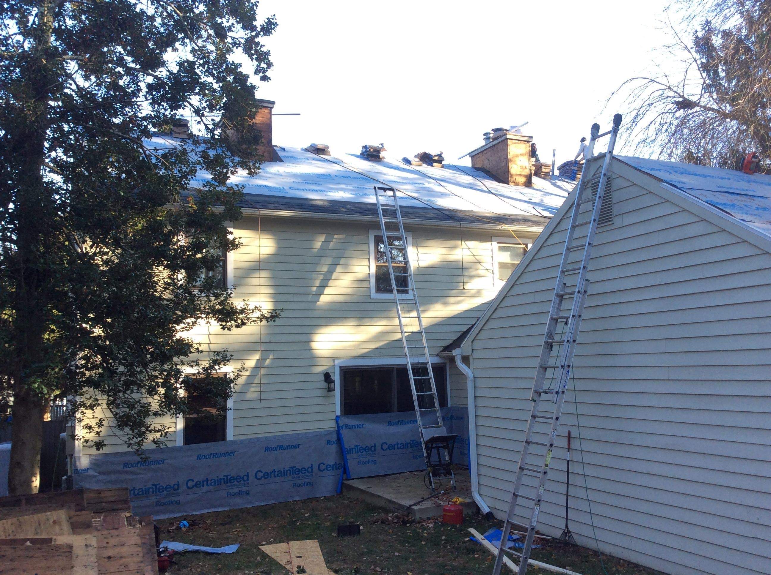 Residential Roofing Installation using Pewterwood Shingles  by Alpha Design Services