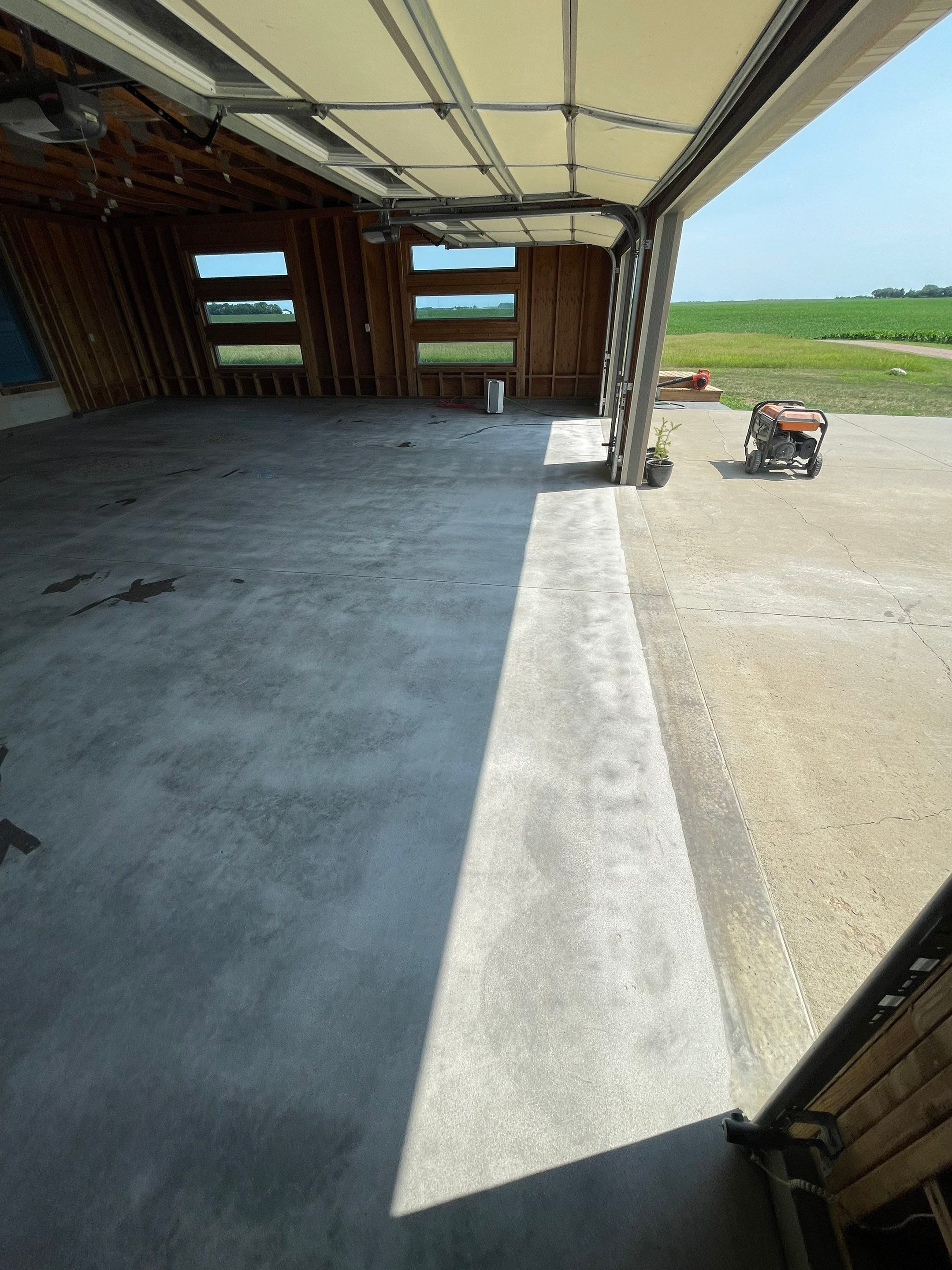 Cabin Fever Coating for Detached Garage in Dell Rapids by Select Painting, Coatings & Garage Cabinets