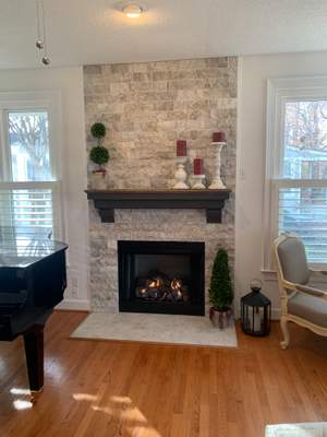 Gas fireplace, custom stone and tile fishes