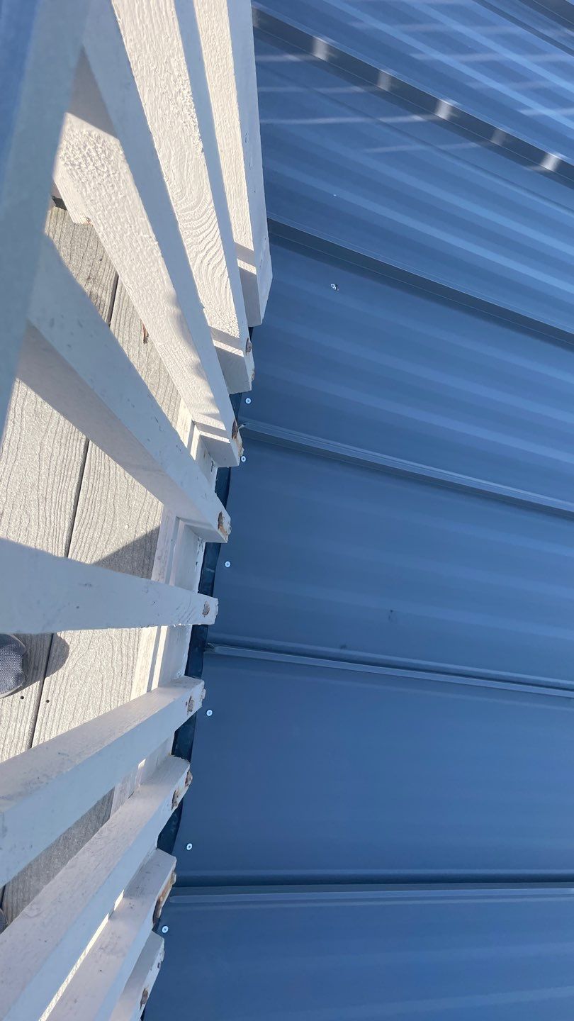 Residential Roofing Installation using Gulf Coast Metals Gulf Seam Panels by Four Peaks Roofing