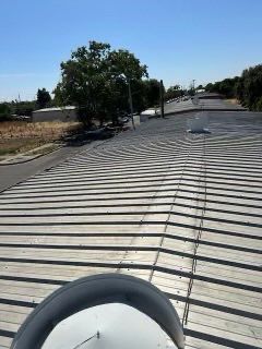 MR Roofing system (Metal Restoration System) using Conklin BenchPly system with PUMA top coat by Straight Edge Roofing Inc