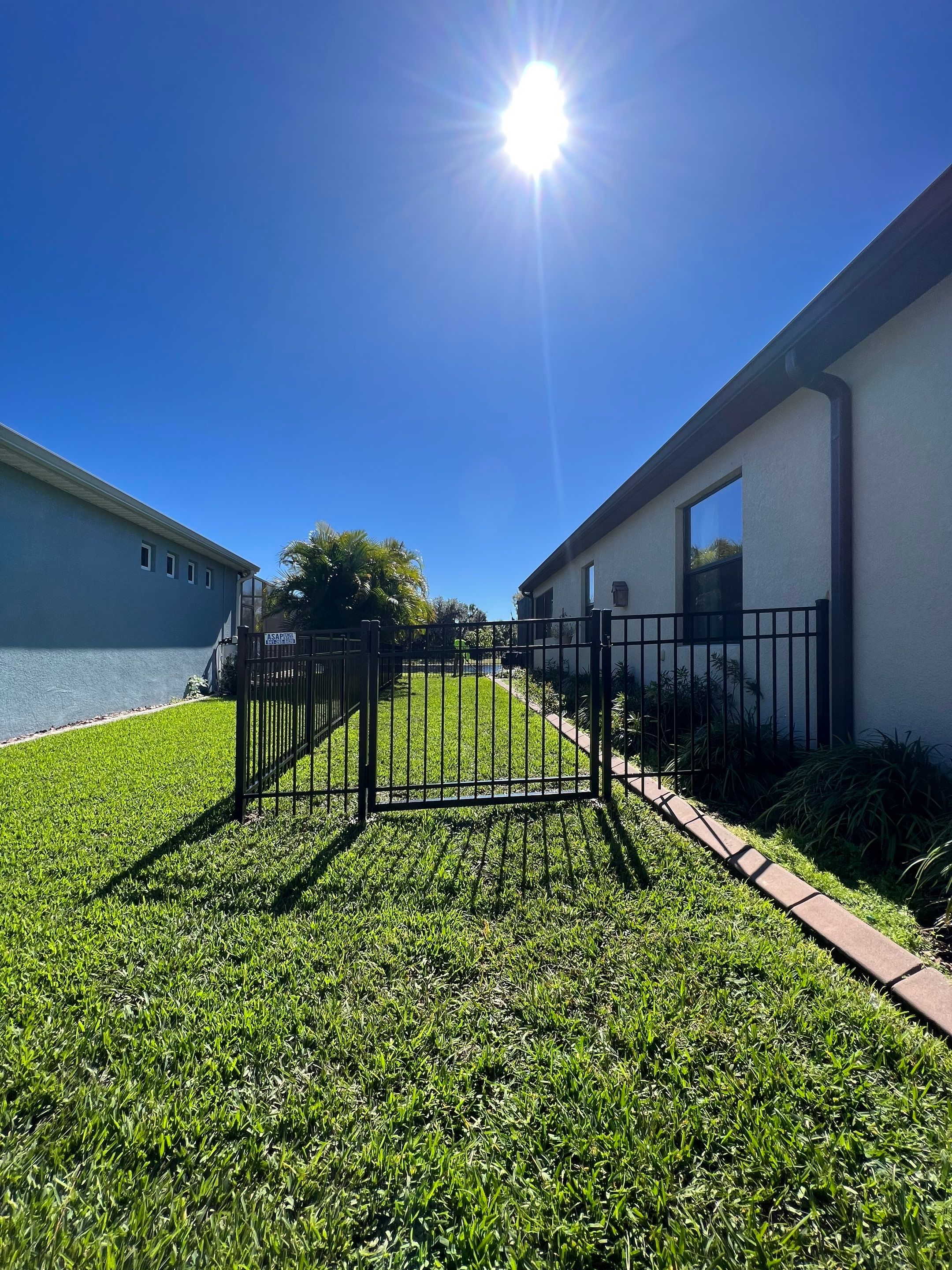 Aluminum Fence Installation using Black 3 Rail Aluminum Fence by Asap fence and gates, LLC