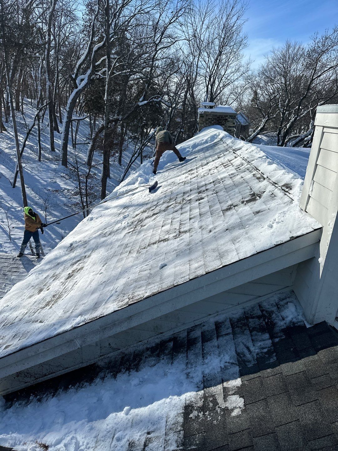 Roof Snow And Ice Dam Removal using Steamer by Stendahl Services