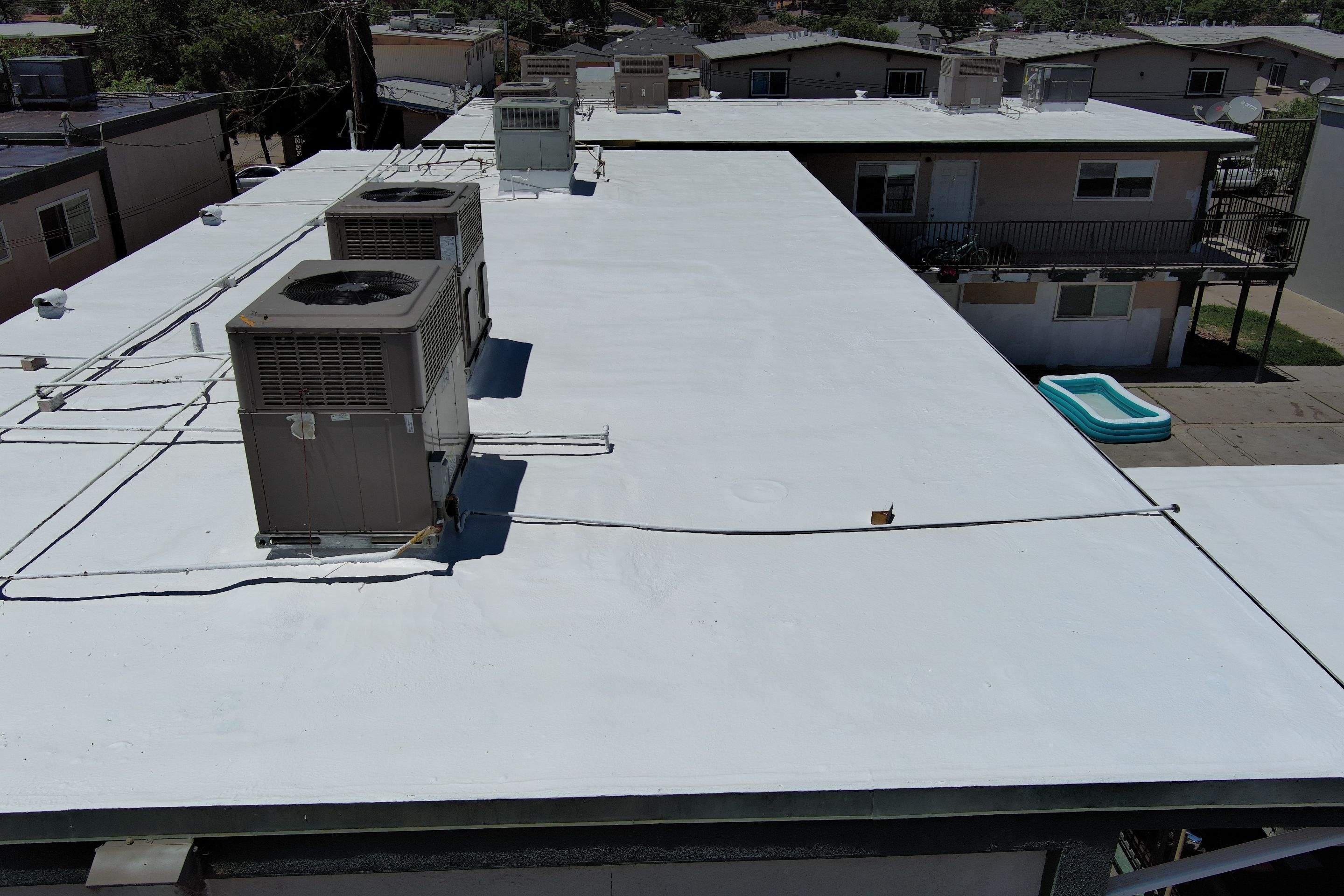 Foam Refurbish using General Coatings acrylic coatings and spray foam by Straight Edge Roofing Inc