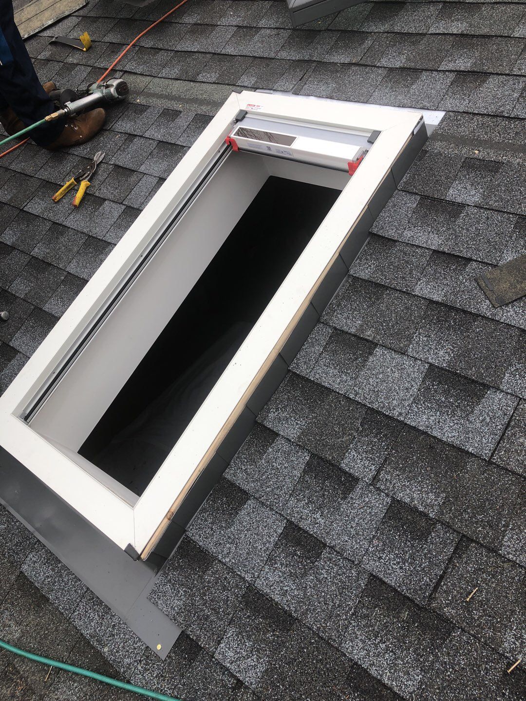 Roof and Skylight Replacement by American Home Contractors