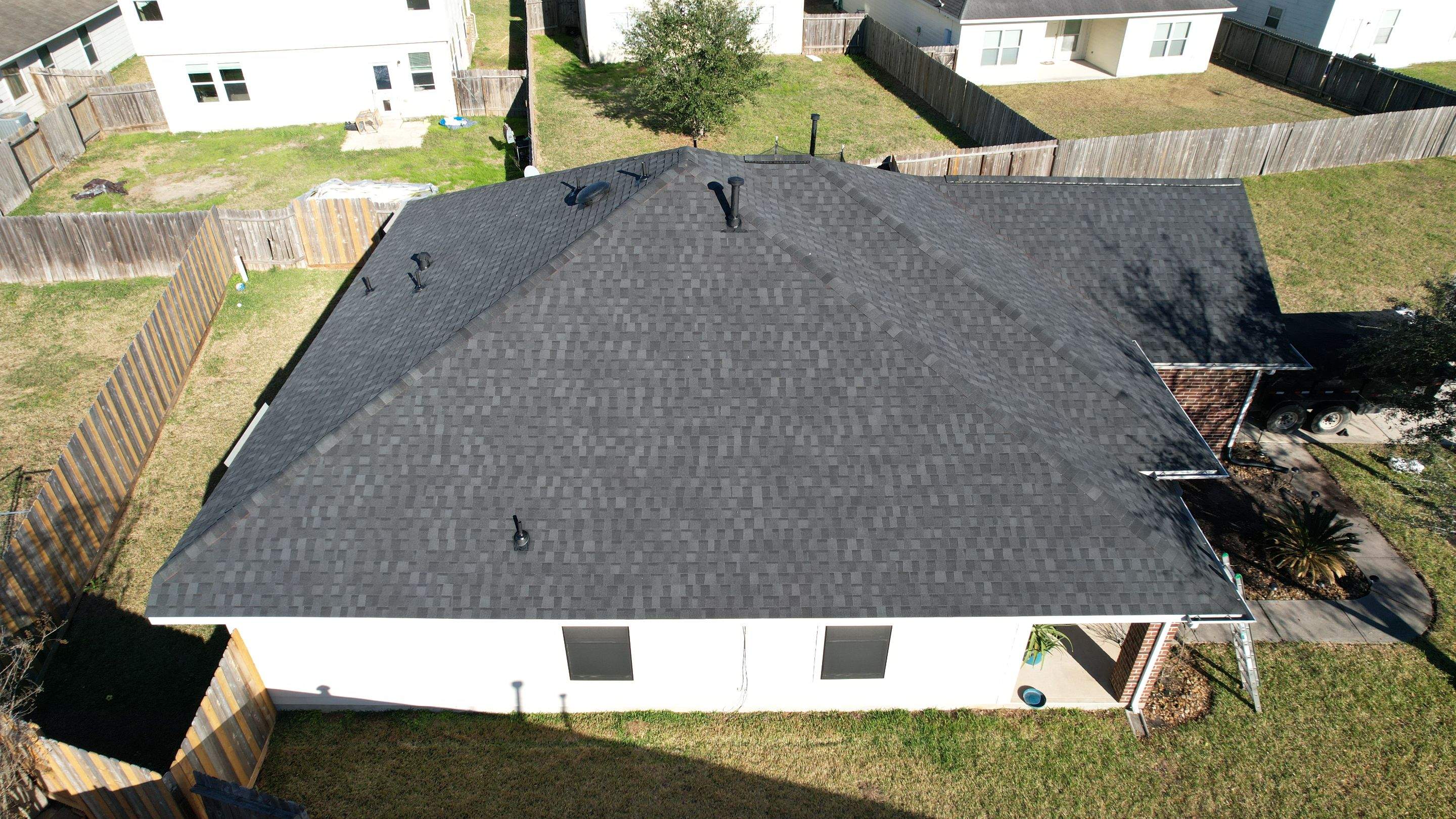 Charcoal Hip-Roof Replacement — Humble, TX by PL Roofing & SB Roofing, LLC.