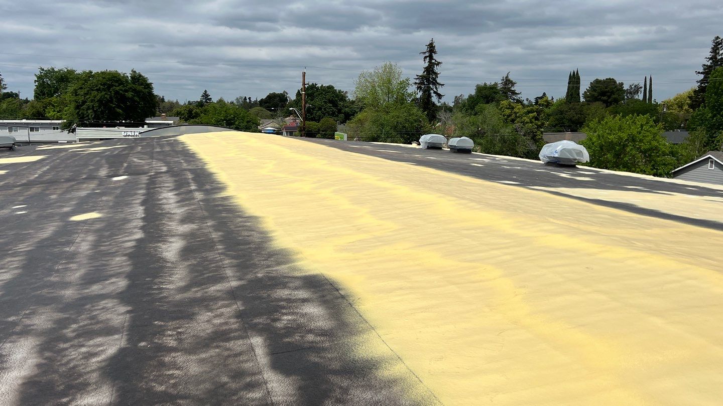 Foam Refurbish using Conklin Benchmark/PUMA XL coatings and spray foam by Straight Edge Roofing Inc