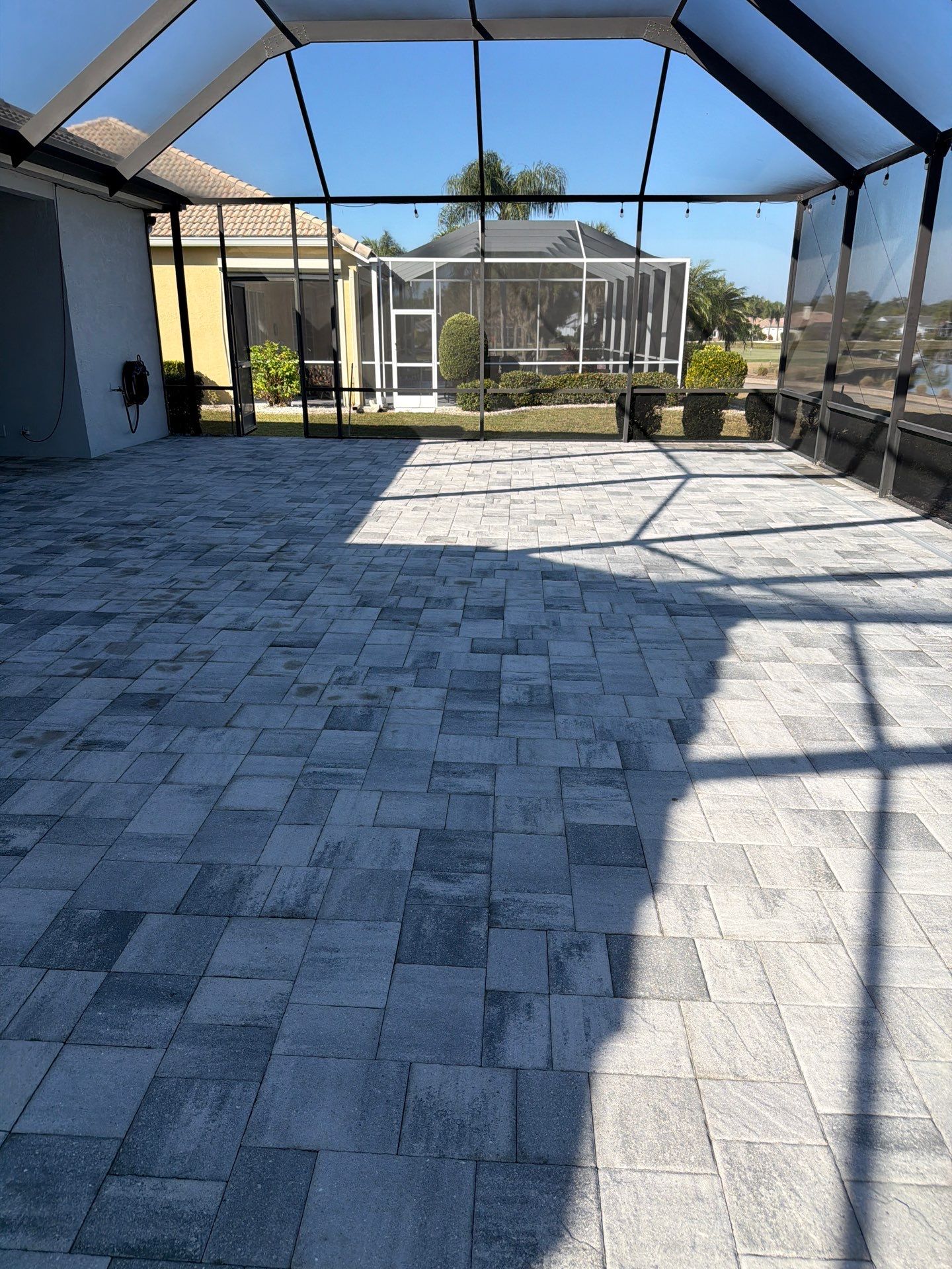 Paver Sealing and Restoration for Screened Lanai in Sun City Center by Supreme Paver Experts