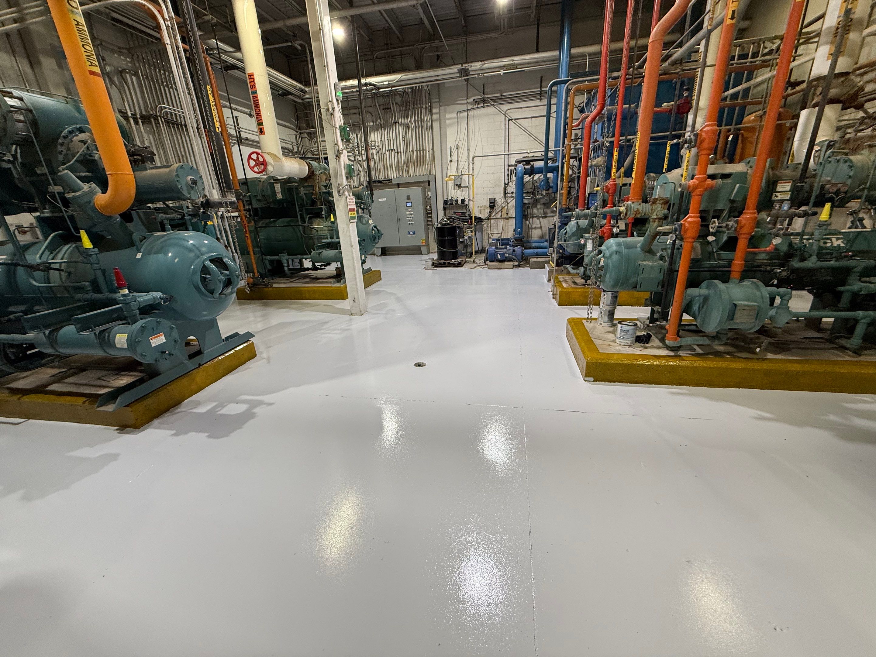 Industrial Epoxy Floor Coating for Perdue Premium Meat Co in Sioux Center by Select Painting, Coatings & Garage Cabinets