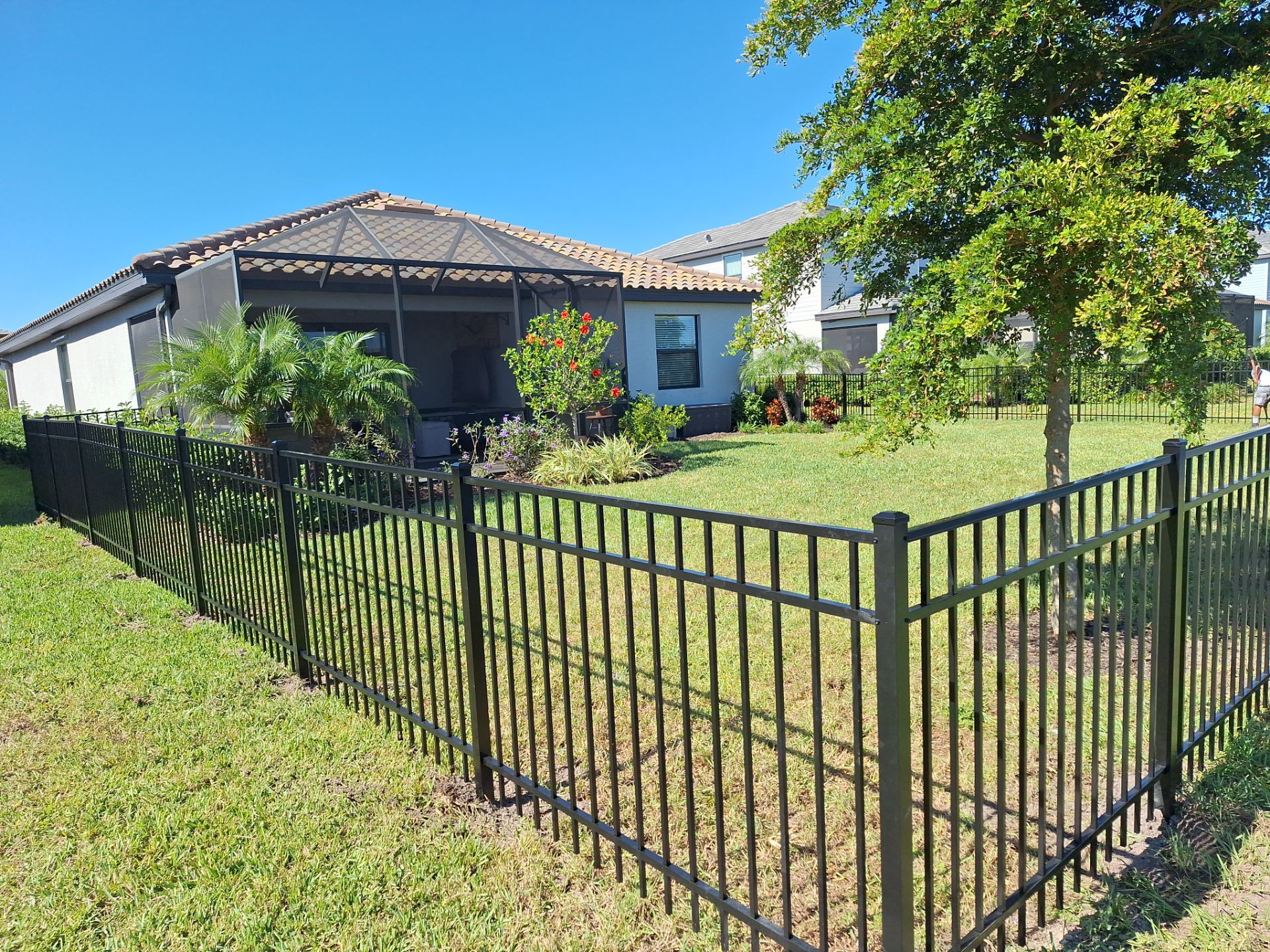Aluminum Fence Installation using 4ft 3 Rail Black Aluminum Fence by Asap fence and gates, LLC