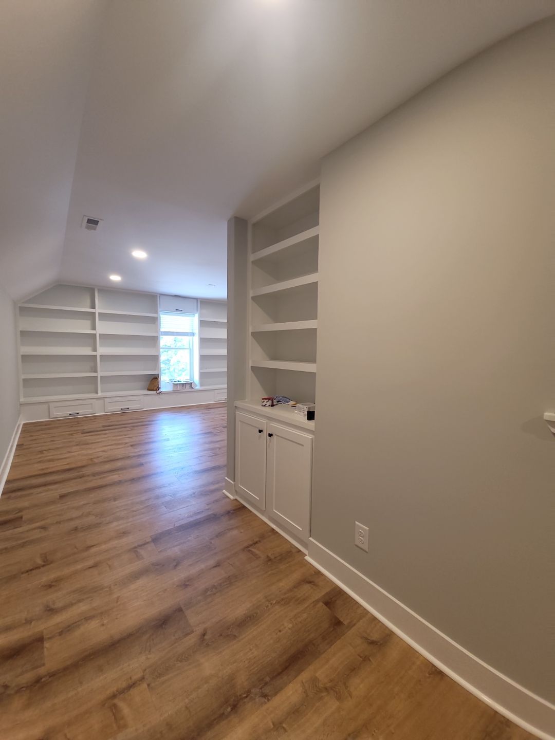 From Rafters to Retreat: An Attic Transformed with a Luxe Bath Escape by Elite Remodeling and Design LLC