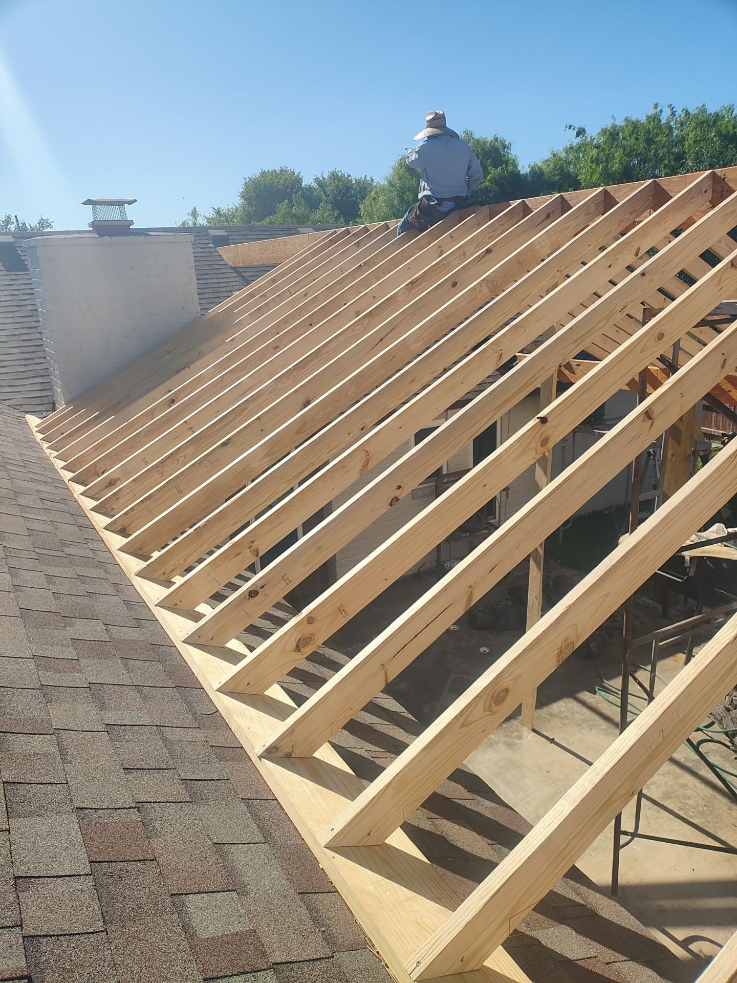 Patio? We got you Covered! by Bayfront Roofing and Construction
