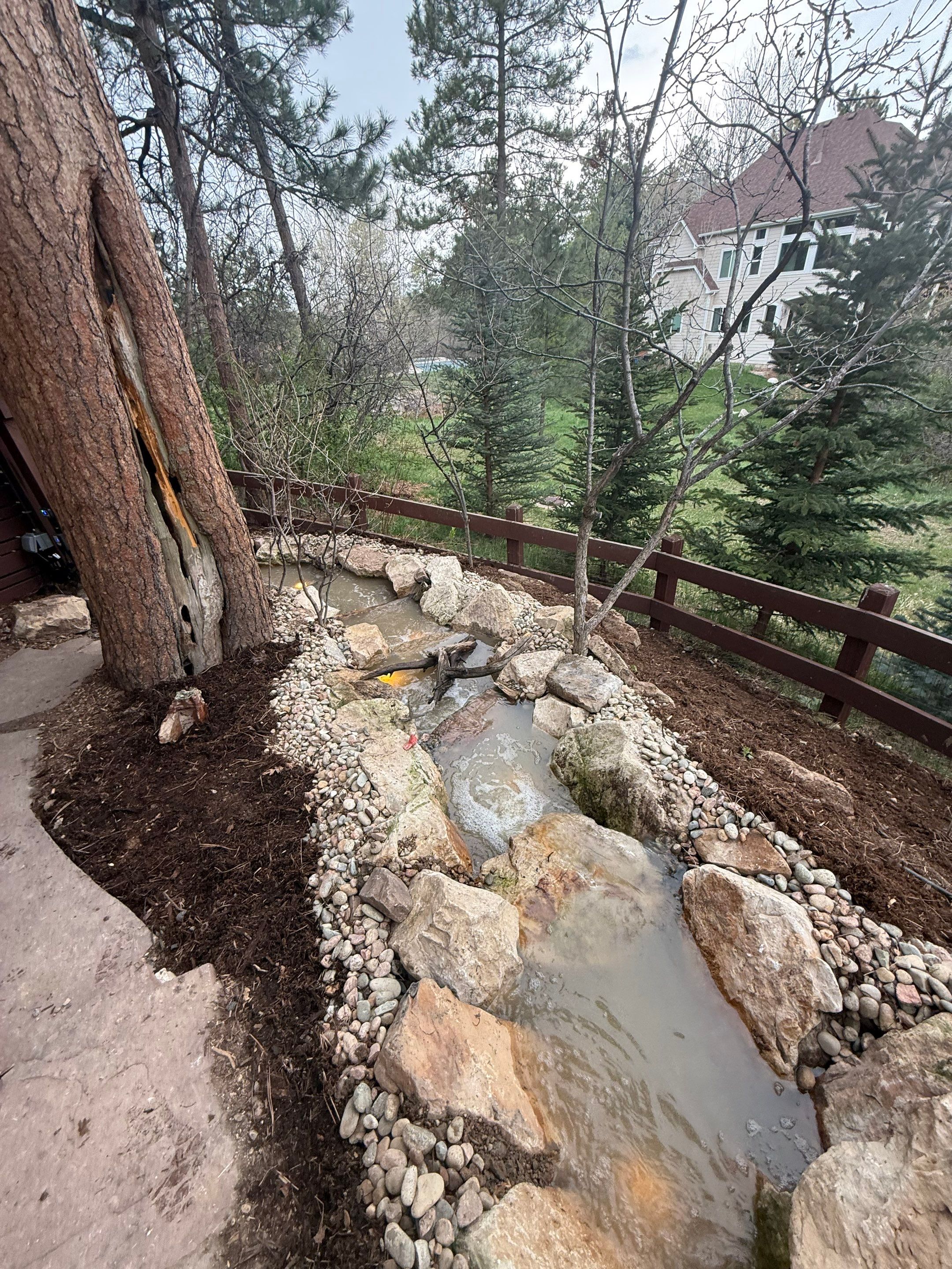Pondless in Castle Pines by JRM landscape & design