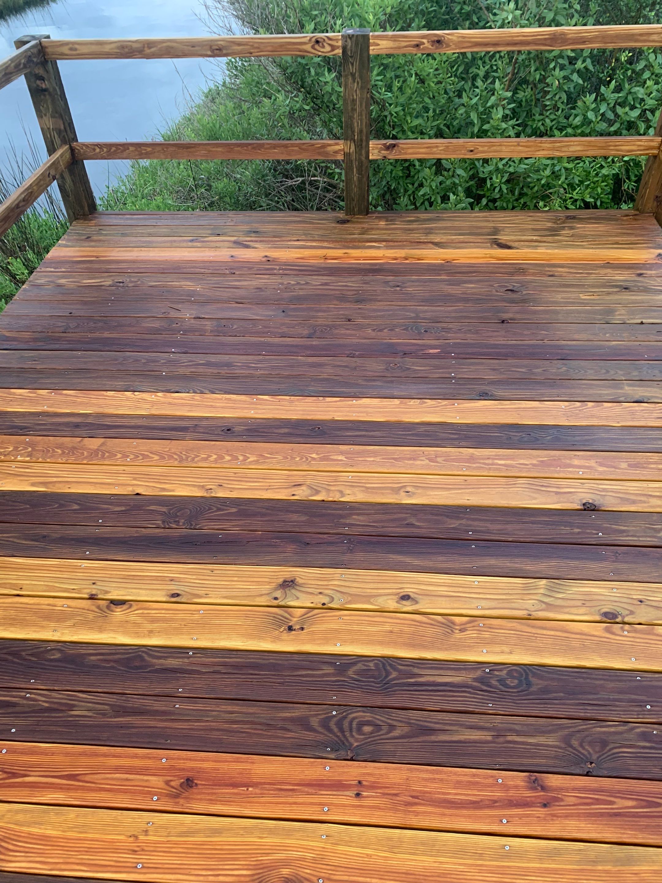 Dock, decks and carport using wood and concrete sealer by DuraSeal